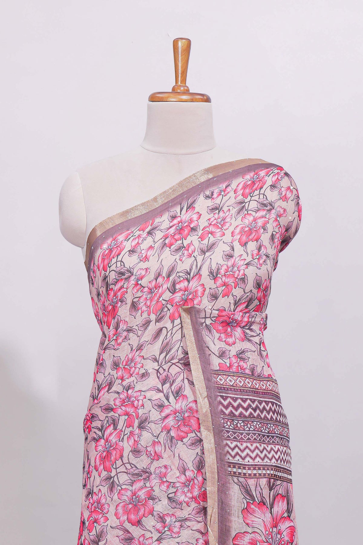 Dusty pink floral designed linen cotton saree with contrast border and matching blouse