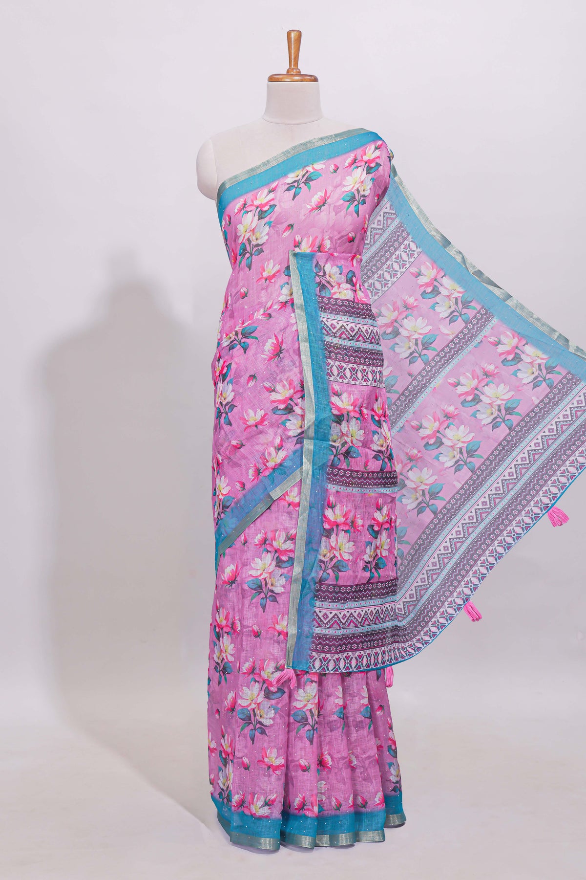 Pink floral designed linen cotton saree with contrast border and matching blouse