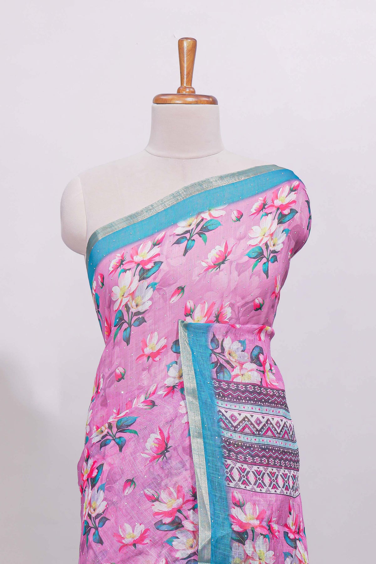 Pink floral designed linen cotton saree with contrast border and matching blouse
