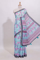 Blue floral designed linen cotton saree with contrast border and matching blouse