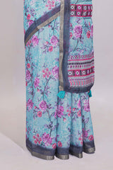 Blue floral designed linen cotton saree with contrast border and matching blouse