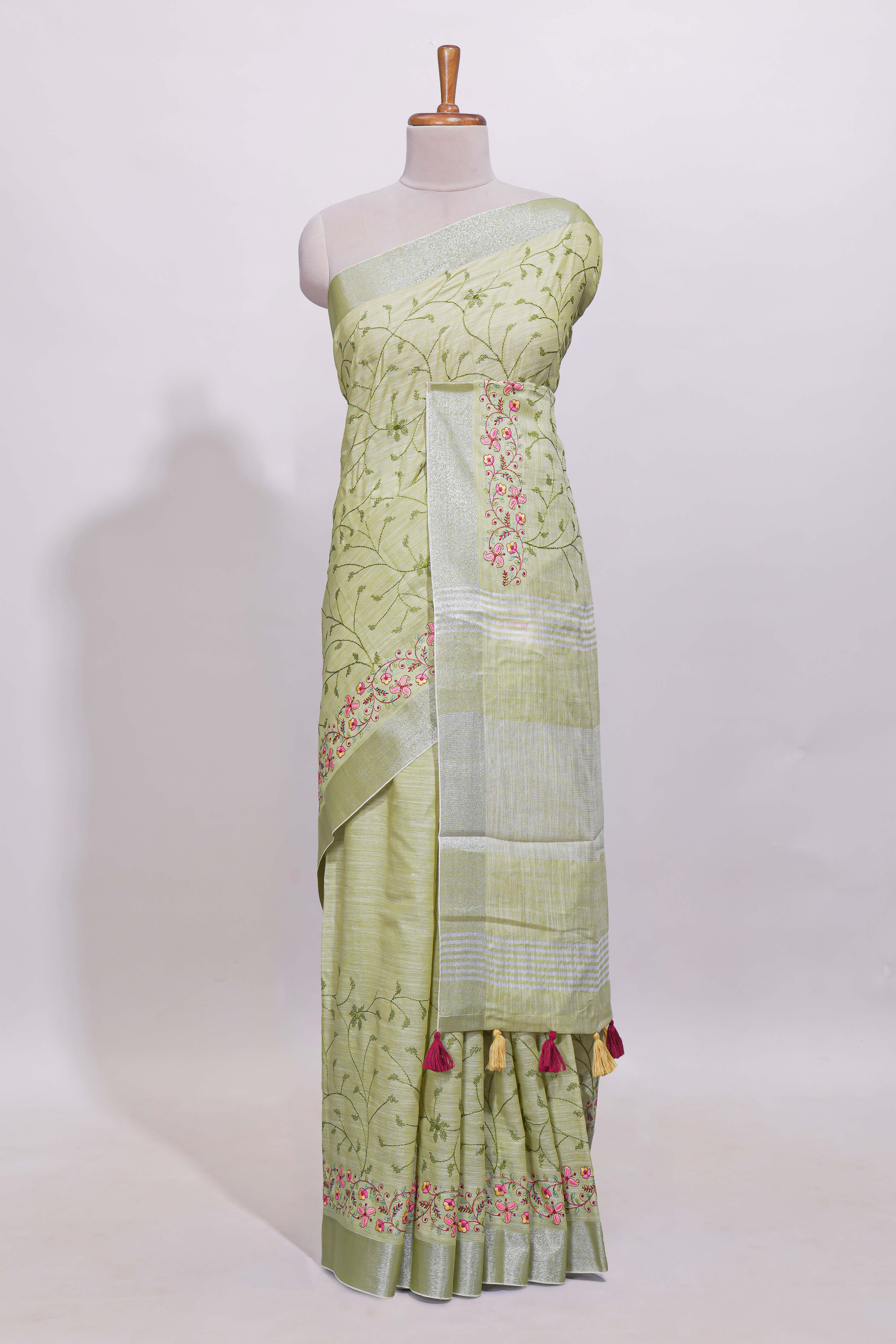 Pastel green floral designed linen cotton saree with self border and matching blouse