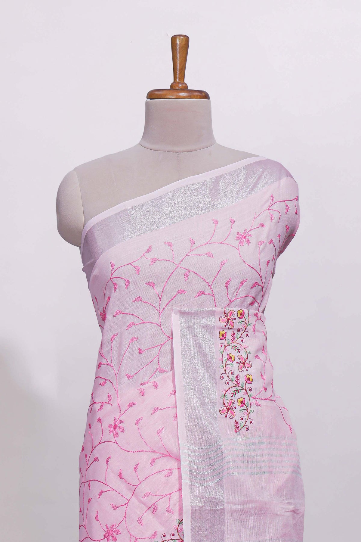 Light pink floral designed linen cotton saree with self border and matching blouse
