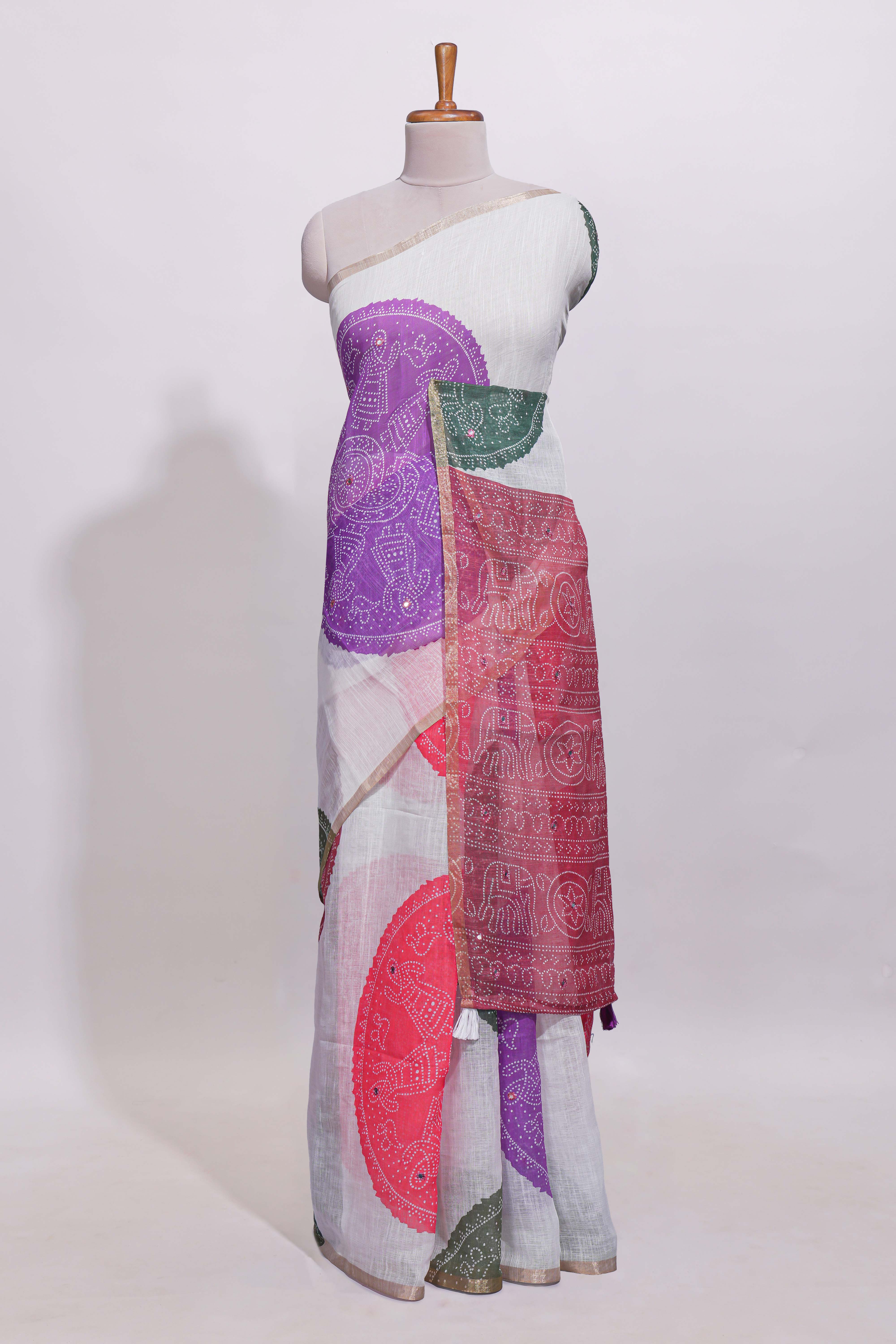 White bandhini designed linen cotton saree with self border and contrast blouse