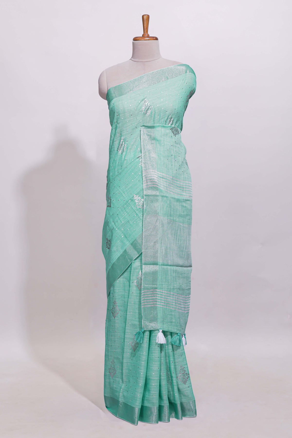 Mint green butta designed linen cotton saree with self zari border and matching blouse