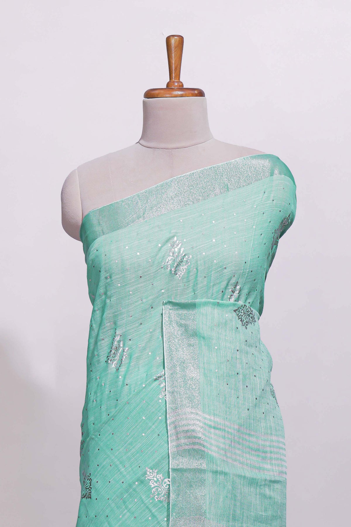 Mint green butta designed linen cotton saree with self zari border and matching blouse