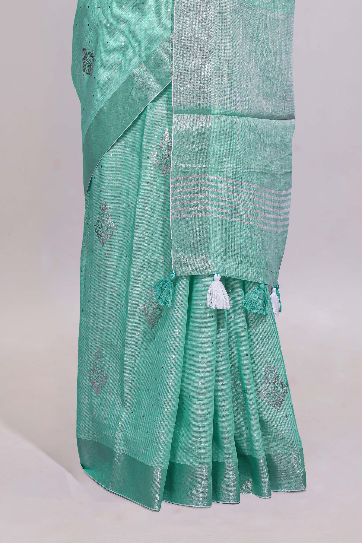 Mint green butta designed linen cotton saree with self zari border and matching blouse