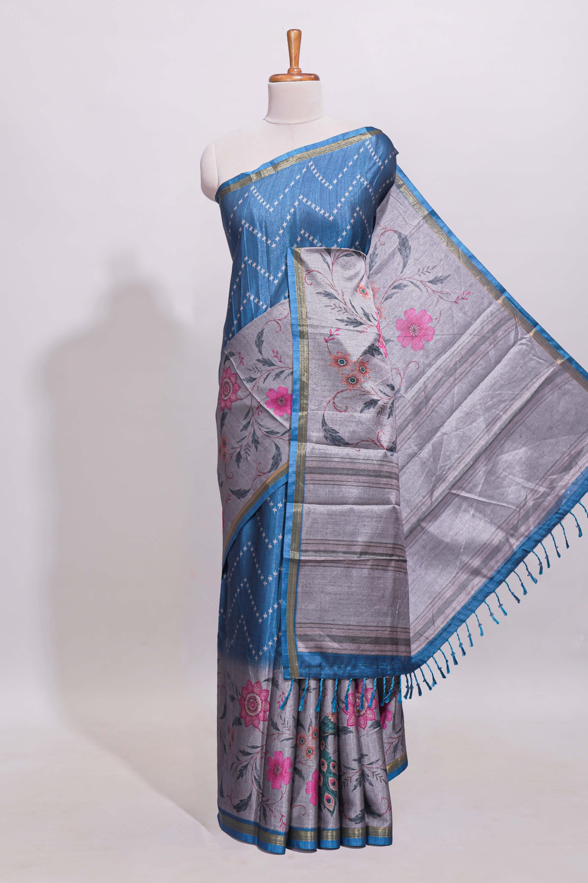 Steel blue geometric designed linen cotton saree with contrast border and blouse