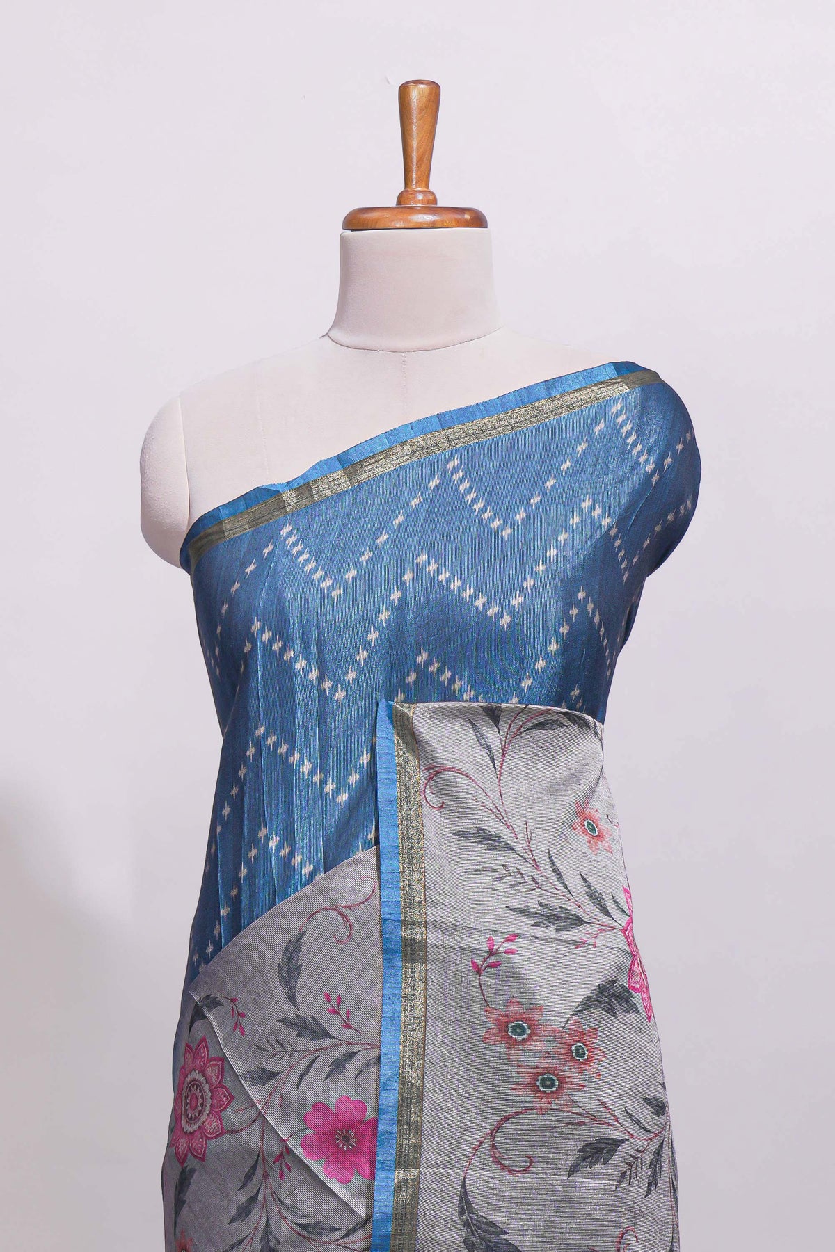 Steel blue geometric designed linen cotton saree with contrast border and blouse