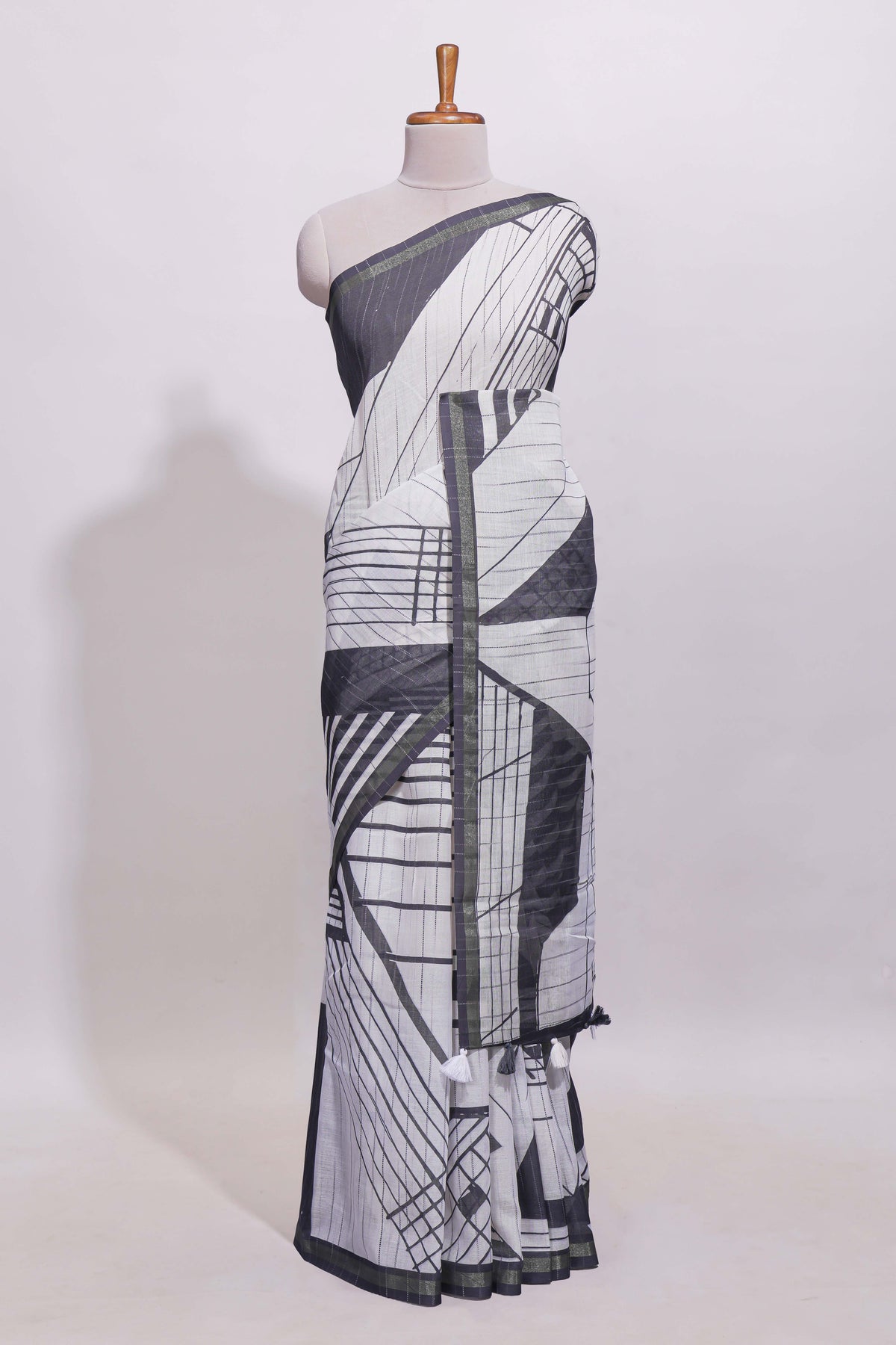 White geometric designed linen cotton saree with contrast border and blouse