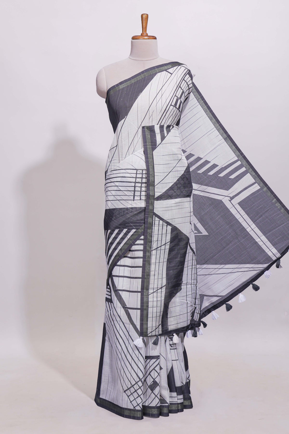 White geometric designed linen cotton saree with contrast border and blouse