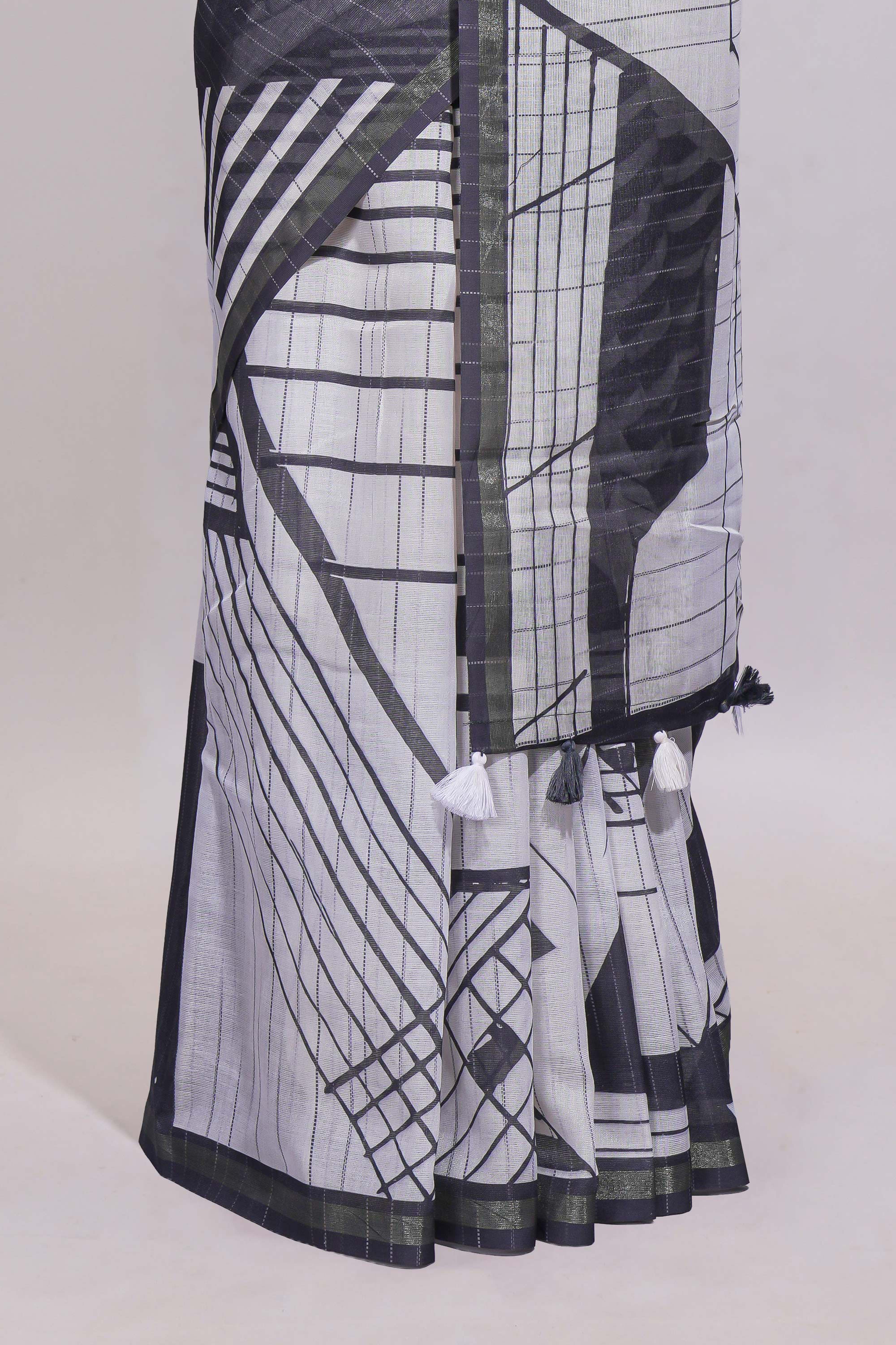 White geometric designed linen cotton saree with contrast border and blouse