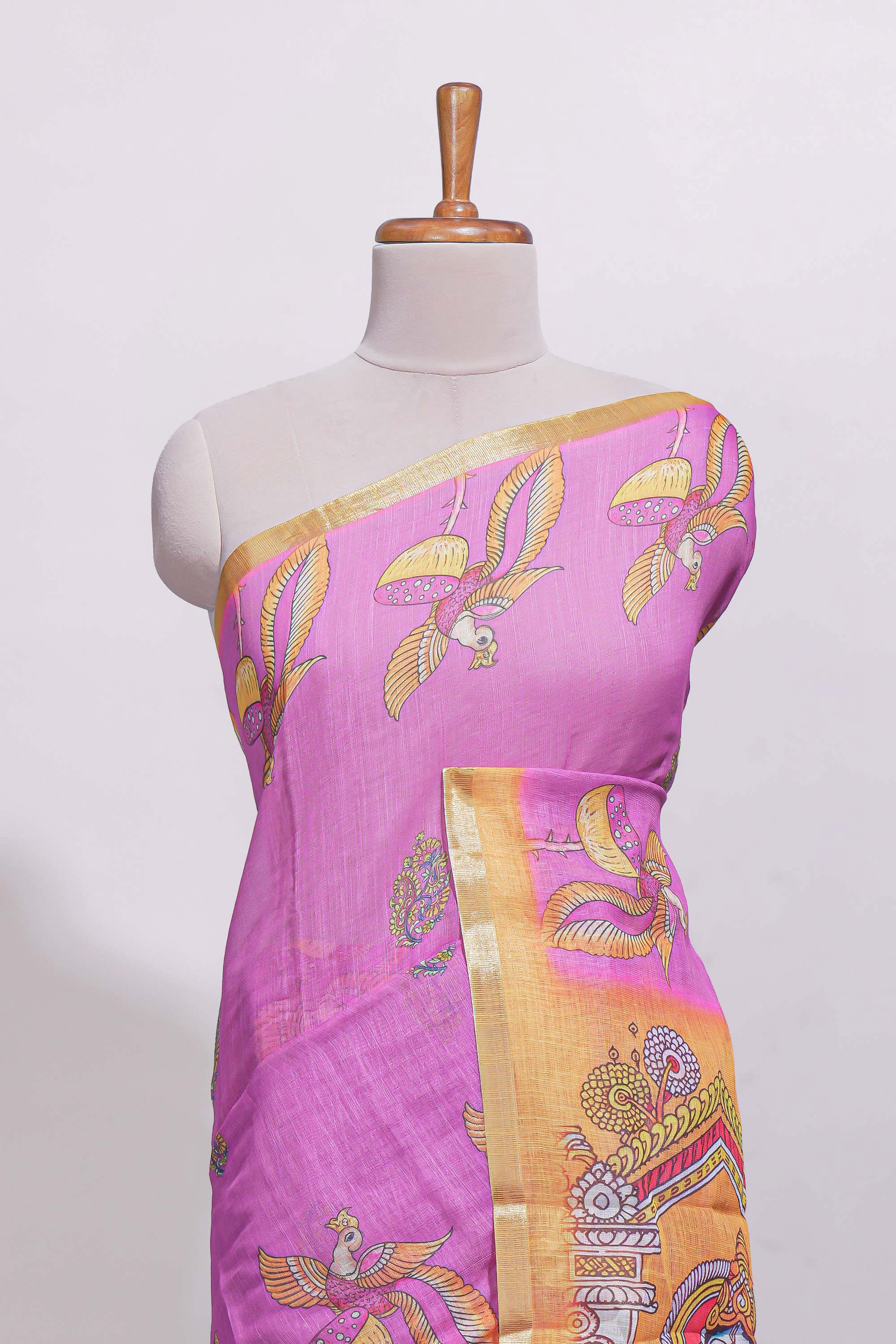 Pink stylized bird motifs linen cotton saree with contrast border and blouse