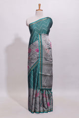 Teal green geometric designed linen cotton saree with contrast border and blouse