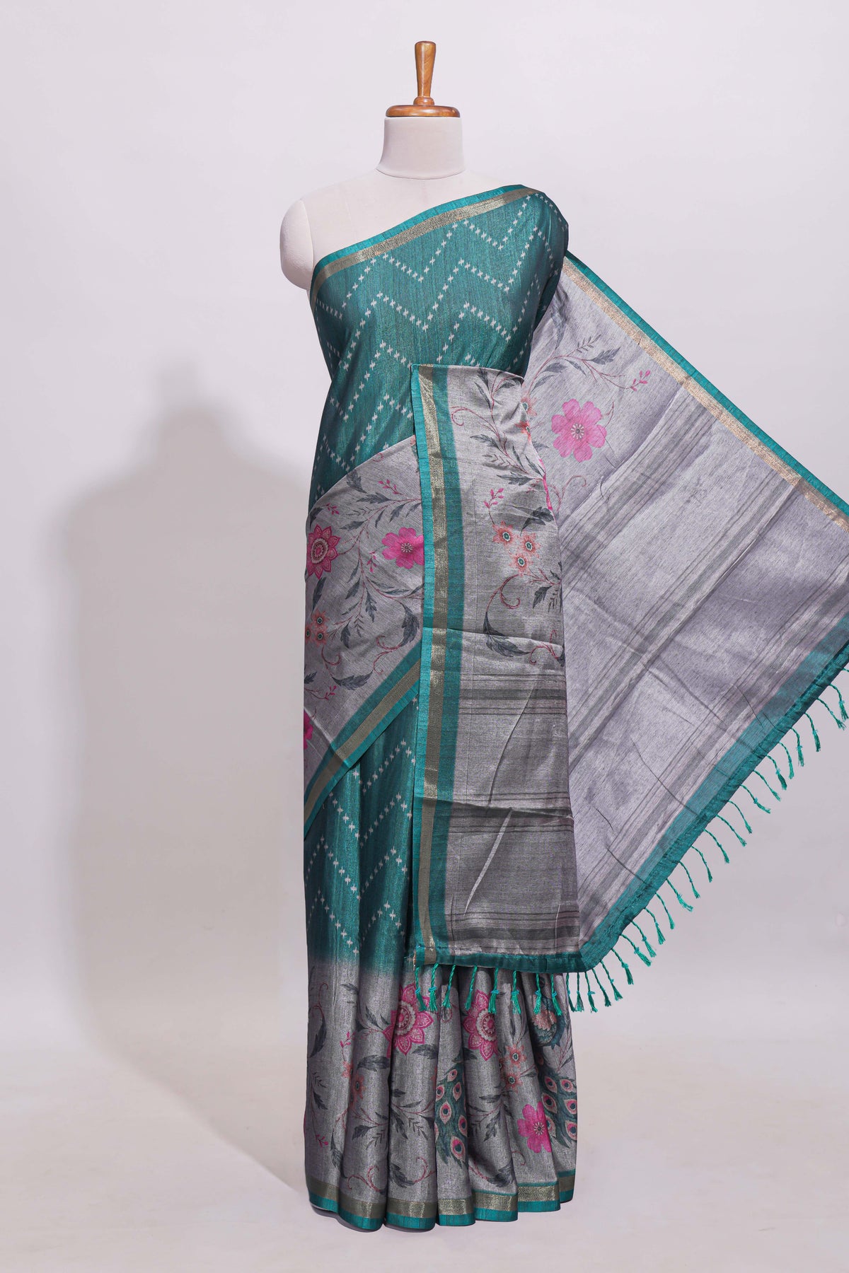 Teal green geometric designed linen cotton saree with contrast border and blouse