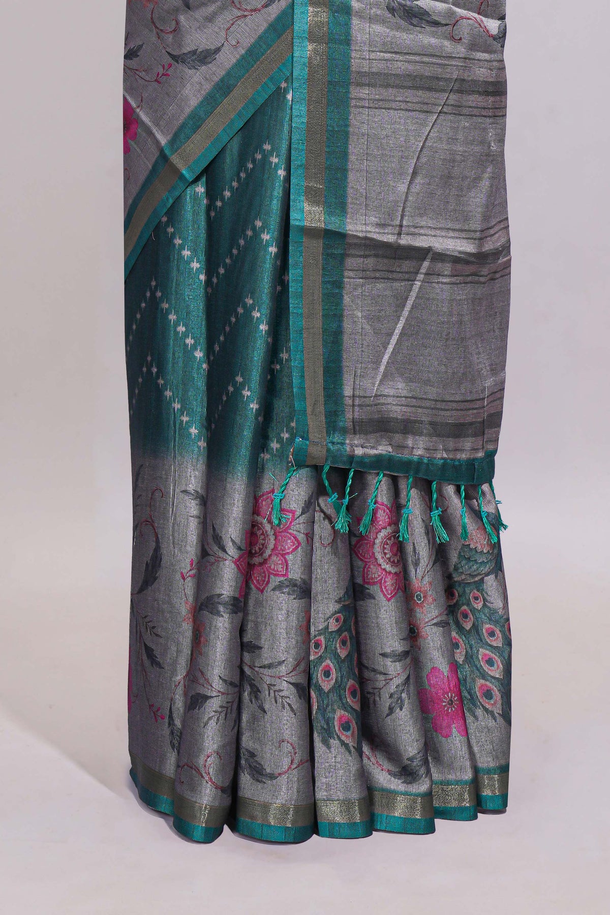 Teal green geometric designed linen cotton saree with contrast border and blouse