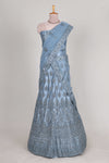 Sea blue colour net lehenga featuring delicate embroidery stone work with a borderless design paired with a matching self shawl
