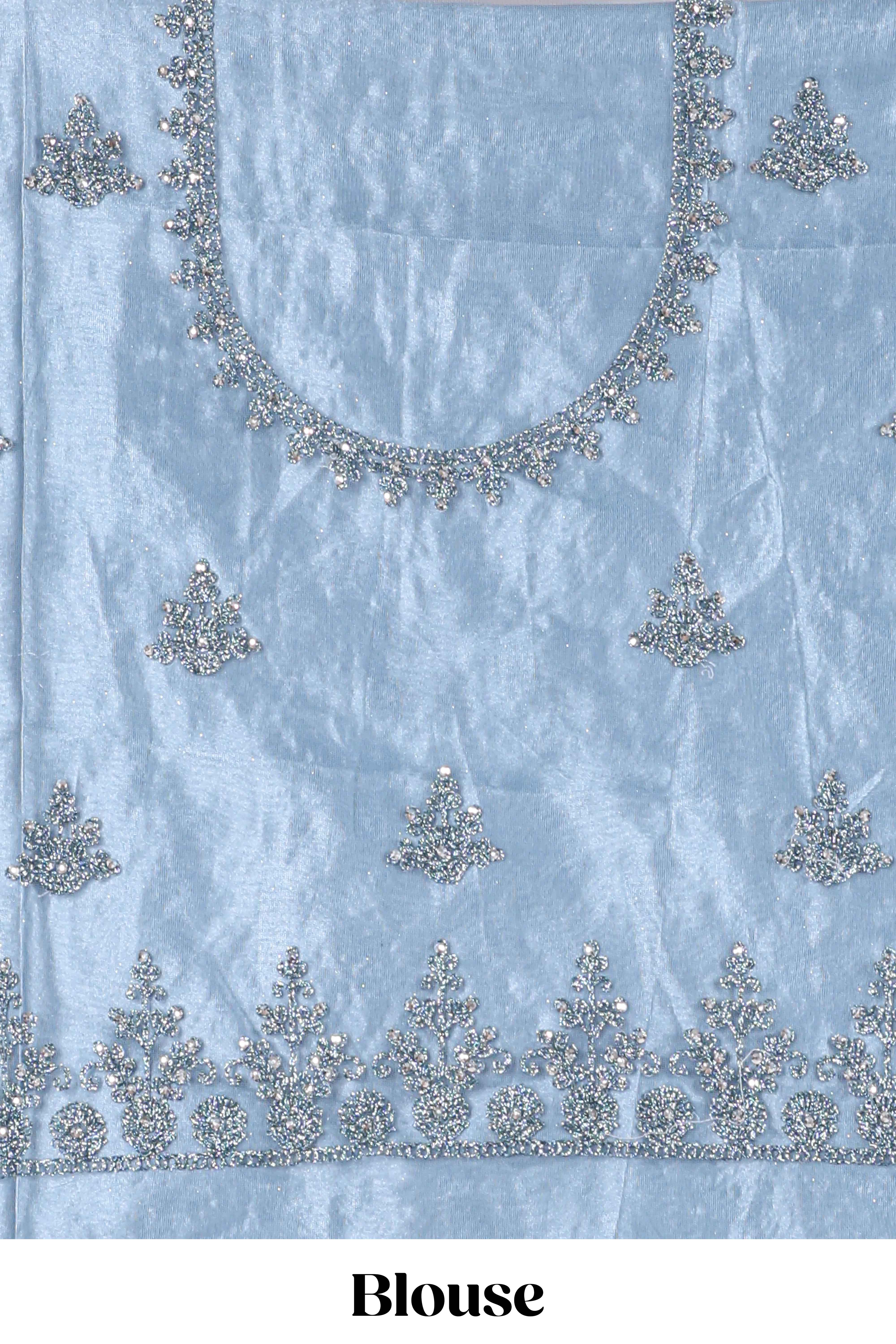 Sea blue colour net lehenga featuring delicate embroidery stone work with a borderless design paired with a matching self shawl