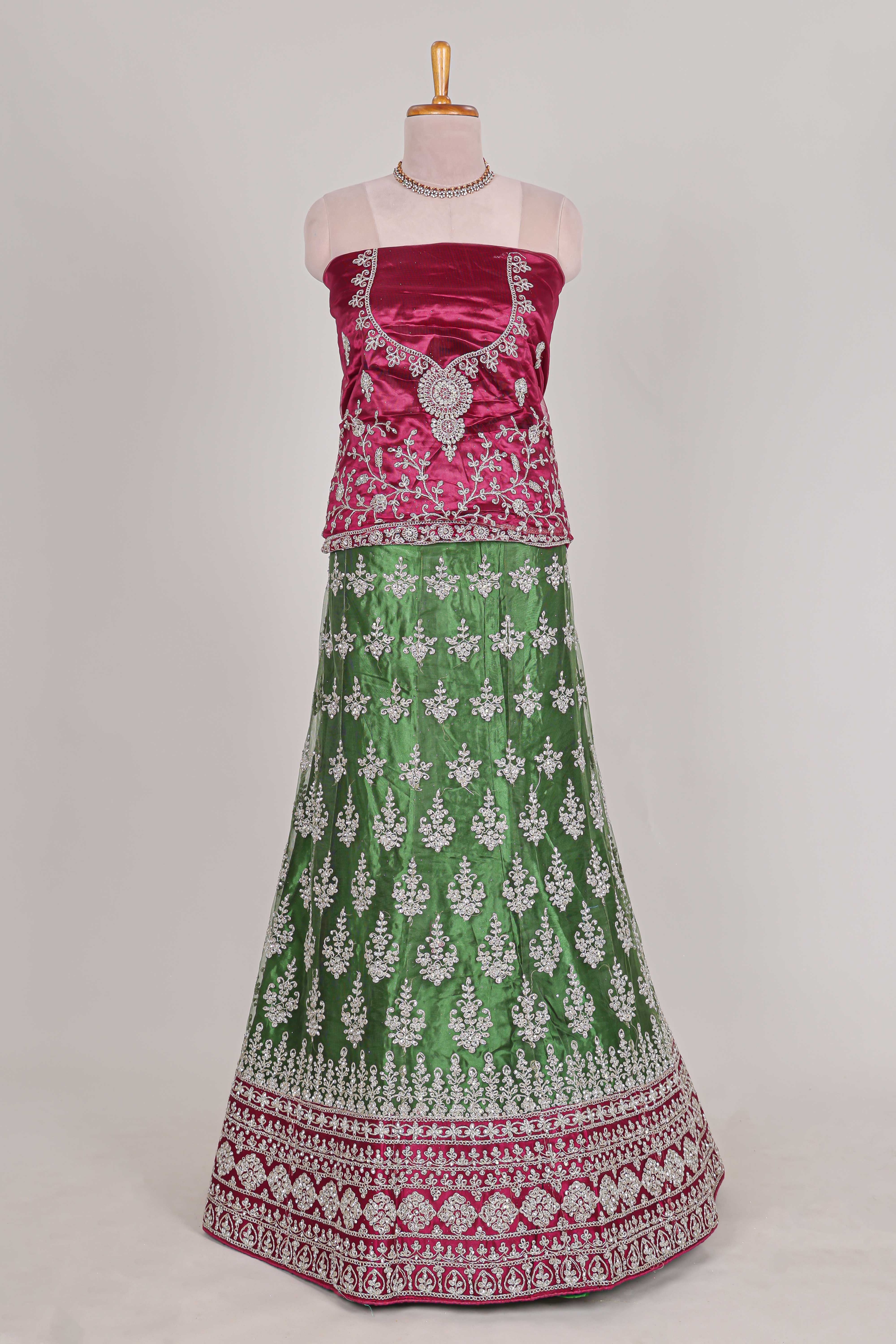 Beautiful net lehenga with intricate embroidery stone work and contrast border paired with a contrast net shawl
