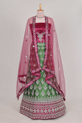 Beautiful net lehenga with intricate embroidery stone work and contrast border paired with a contrast net shawl