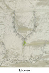 powder green net lehenga featuring delicate embroidery with a borderless design paired with a matching self shawl