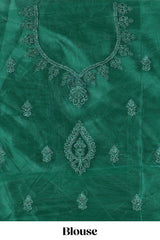 Bottle Green net lehenga featuring delicate embroidery with a borderless design paired with a matching self shawl