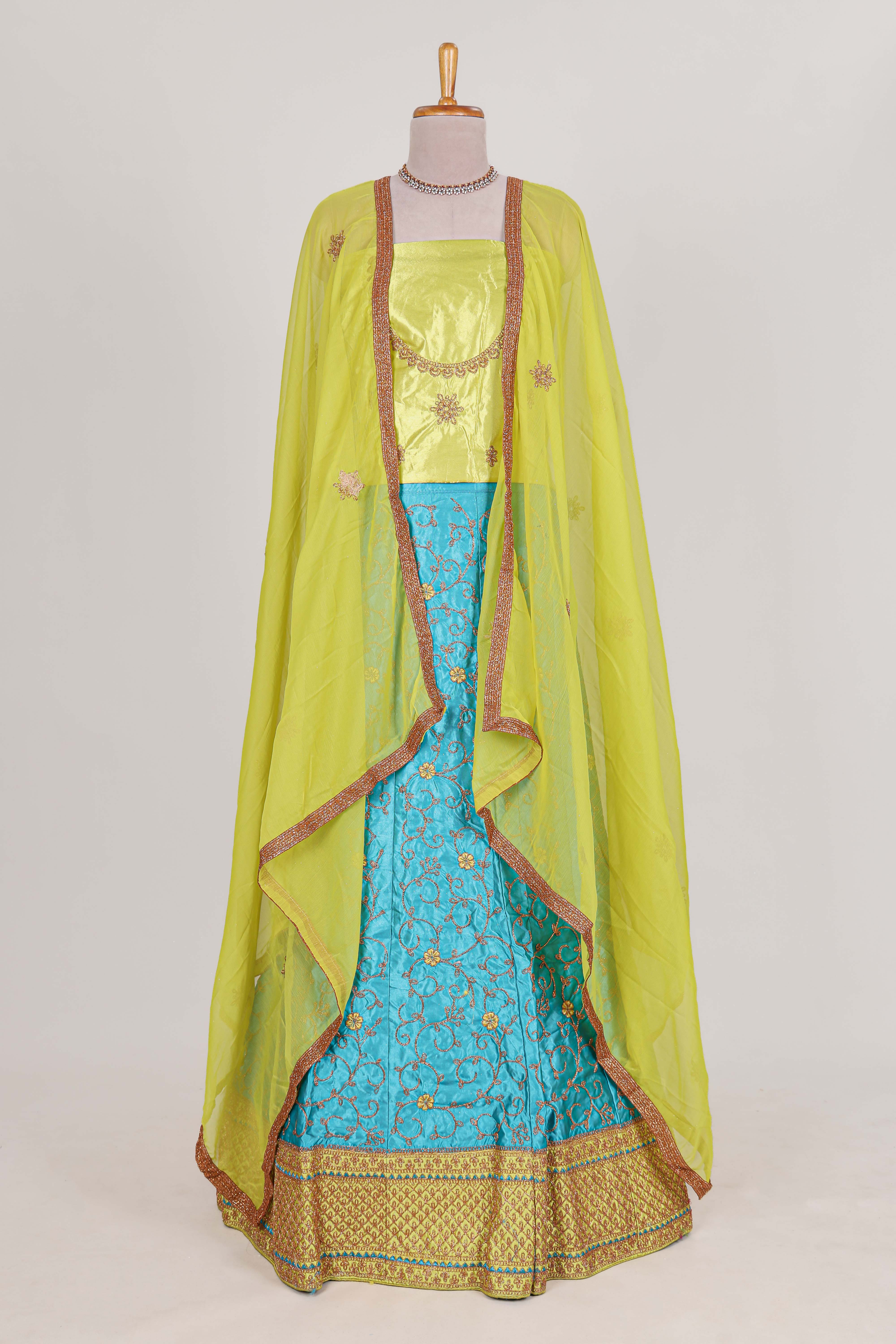 Blue and yellow satin lehenga embroidery with a beautiful contrast border paired with a matching embroidered blouse