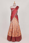 Rani pink tissue lehenga featuring intricate thread weaving details with a beautiful contrast border Paired with a brocadeshawl