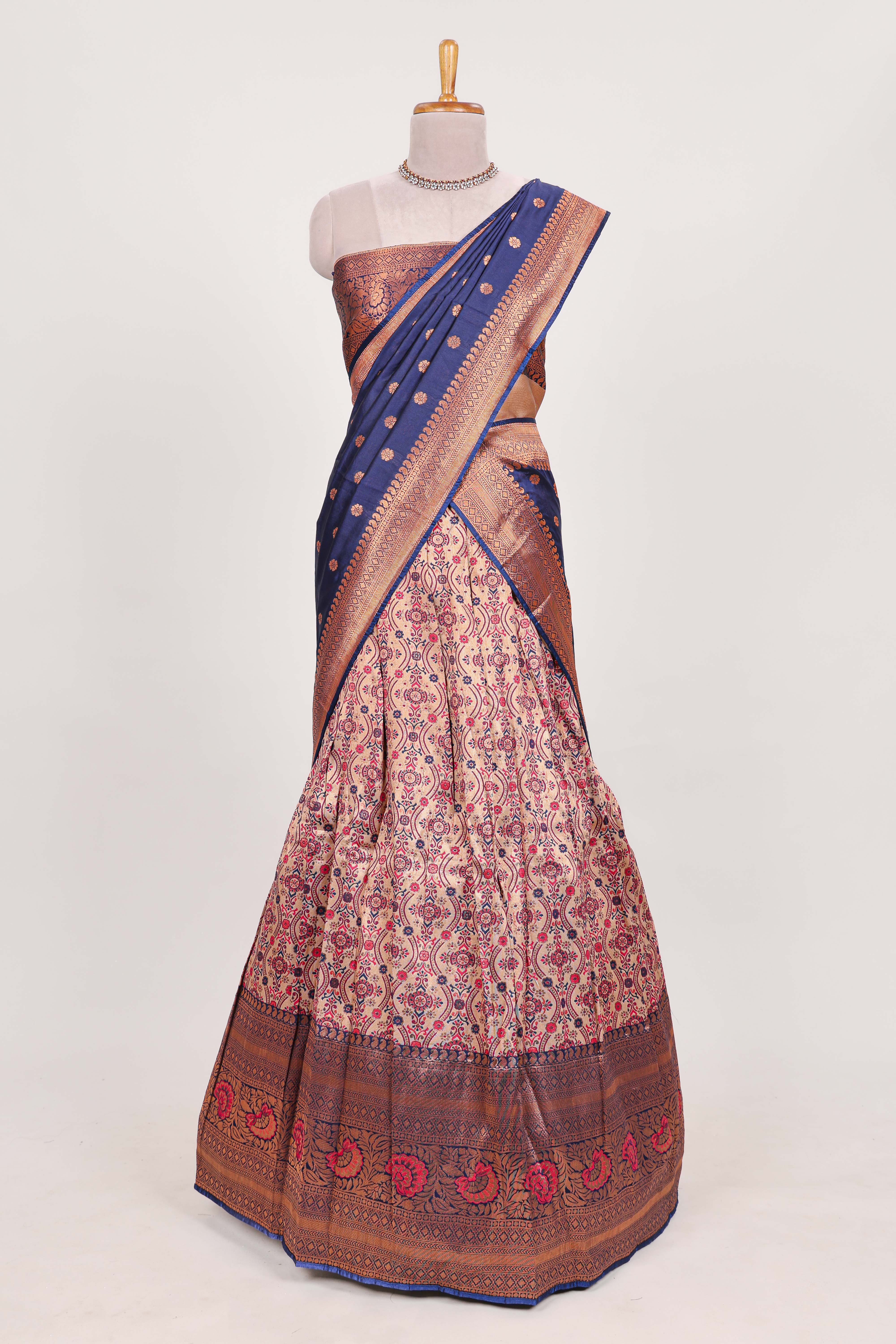 Navy bluetissue lehenga featuring intricate thread weaving details with a beautiful contrast border Paired with a brocadeshawl