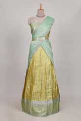 Lemon yellow tissue lehenga featuring elegant vertical line patterns with a beautiful contrast border Paired with a matching shawl