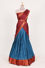 Royal bluesilk cotton lehenga with a rich maroon shawl with a traditional silver zari woven border and contrast blouse
