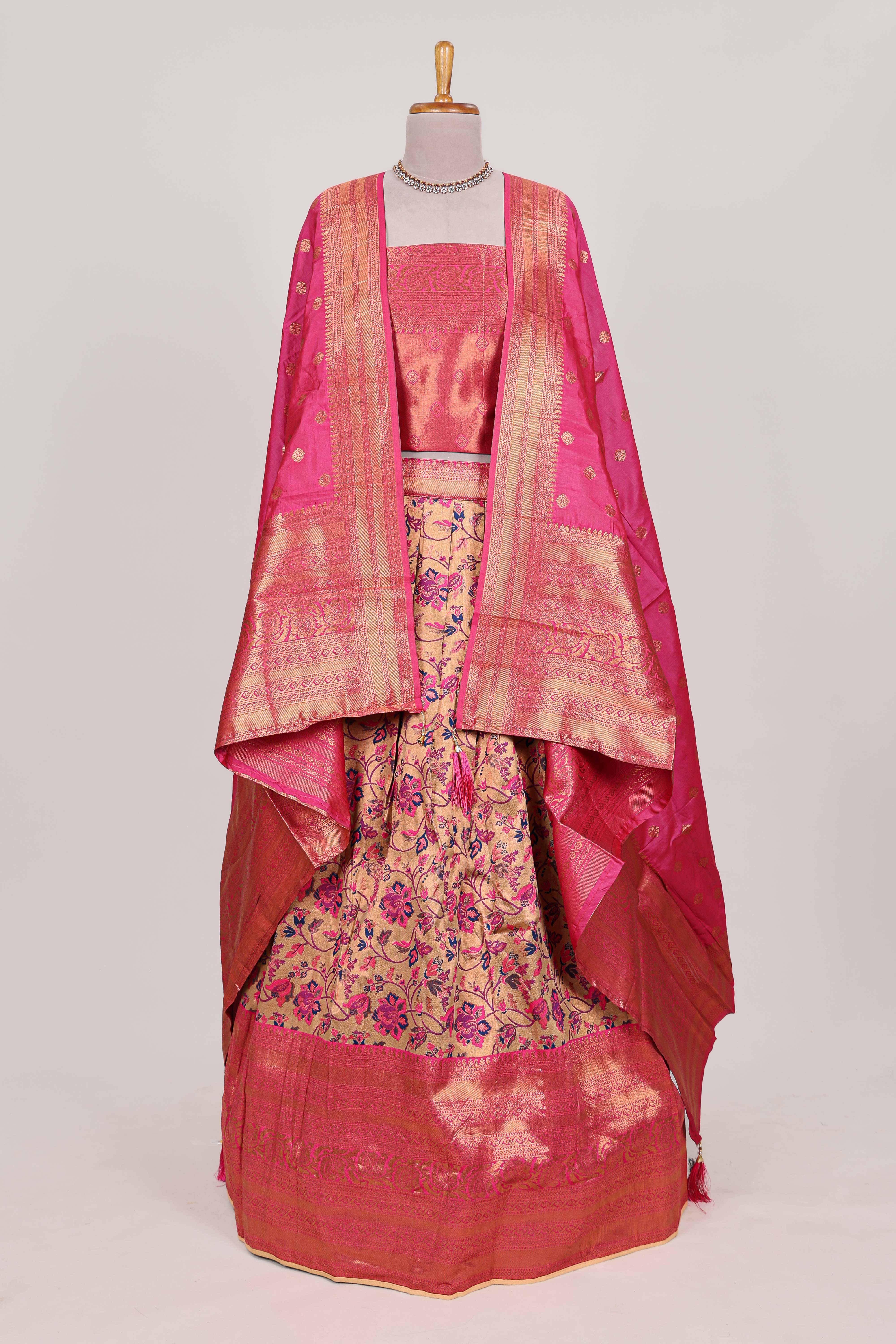 Pink colour eleganttissue lehenga featuring intricate thread weaving details with a beautiful contrast border Paired with a brocadeshawl