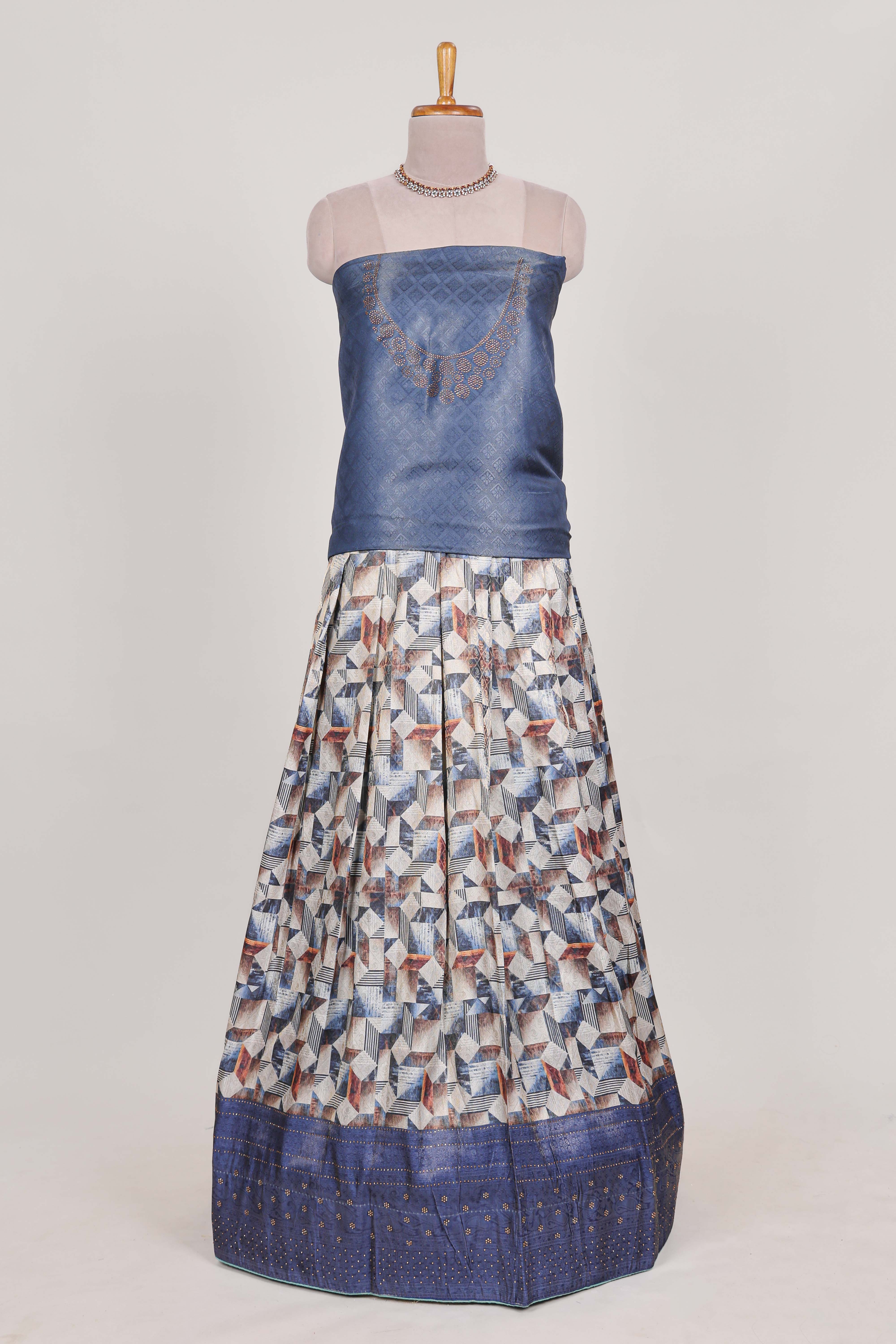 Ocean blue colour eleganttissue lehenga featuring intricate thread weaving details with a beautiful contrast border Paired with a brocadeshawl