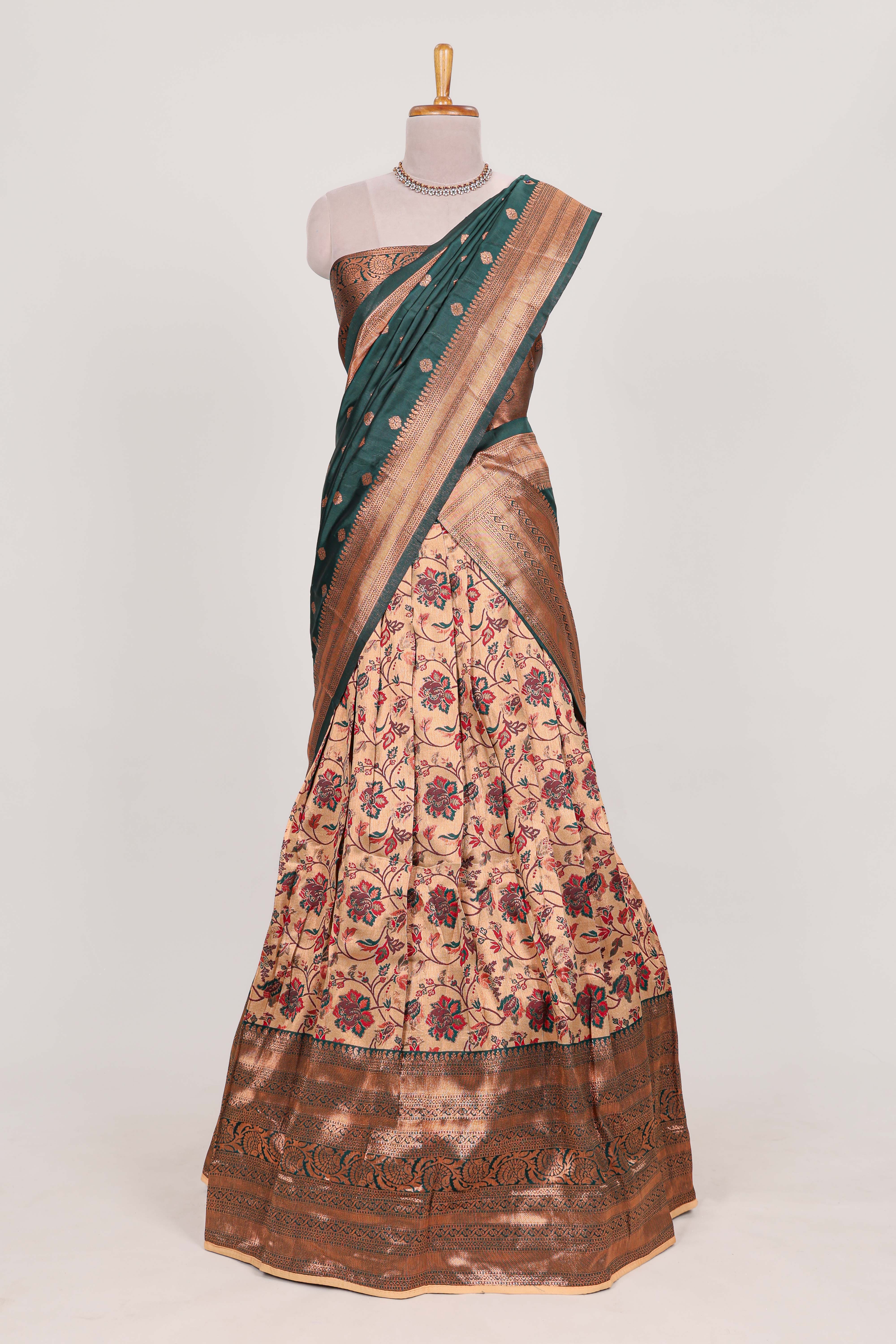 Dark green colour eleganttissue lehenga featuring intricate thread weaving details with a beautiful contrast border Paired with a brocadeshawl