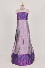 Rich royal purple tissue lehenga featuring intricate thread weaving details with a beautiful contrast border Paired with a brocadeshawl