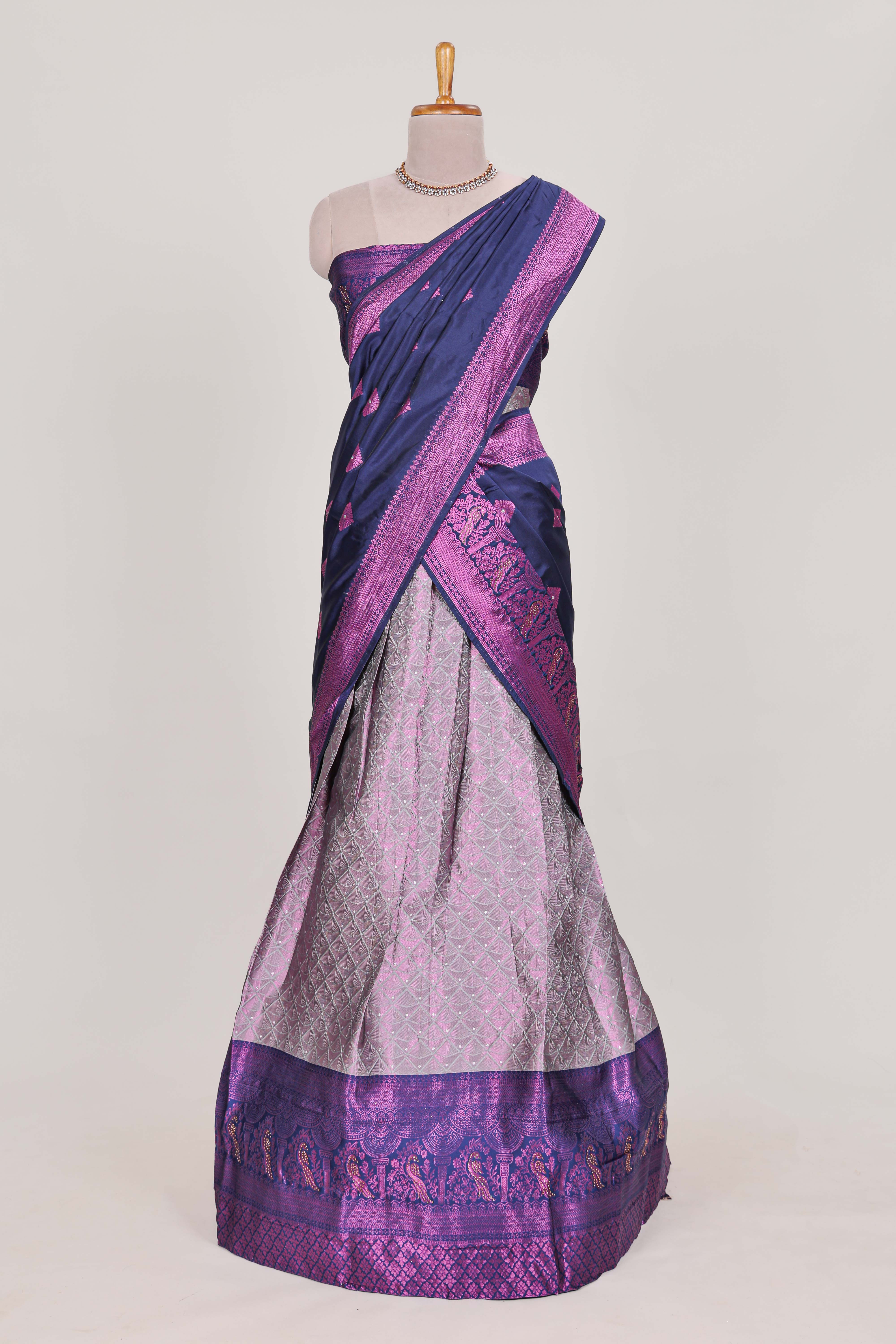 Rich royal purple tissue lehenga featuring intricate thread weaving details with a beautiful contrast border Paired with a brocadeshawl