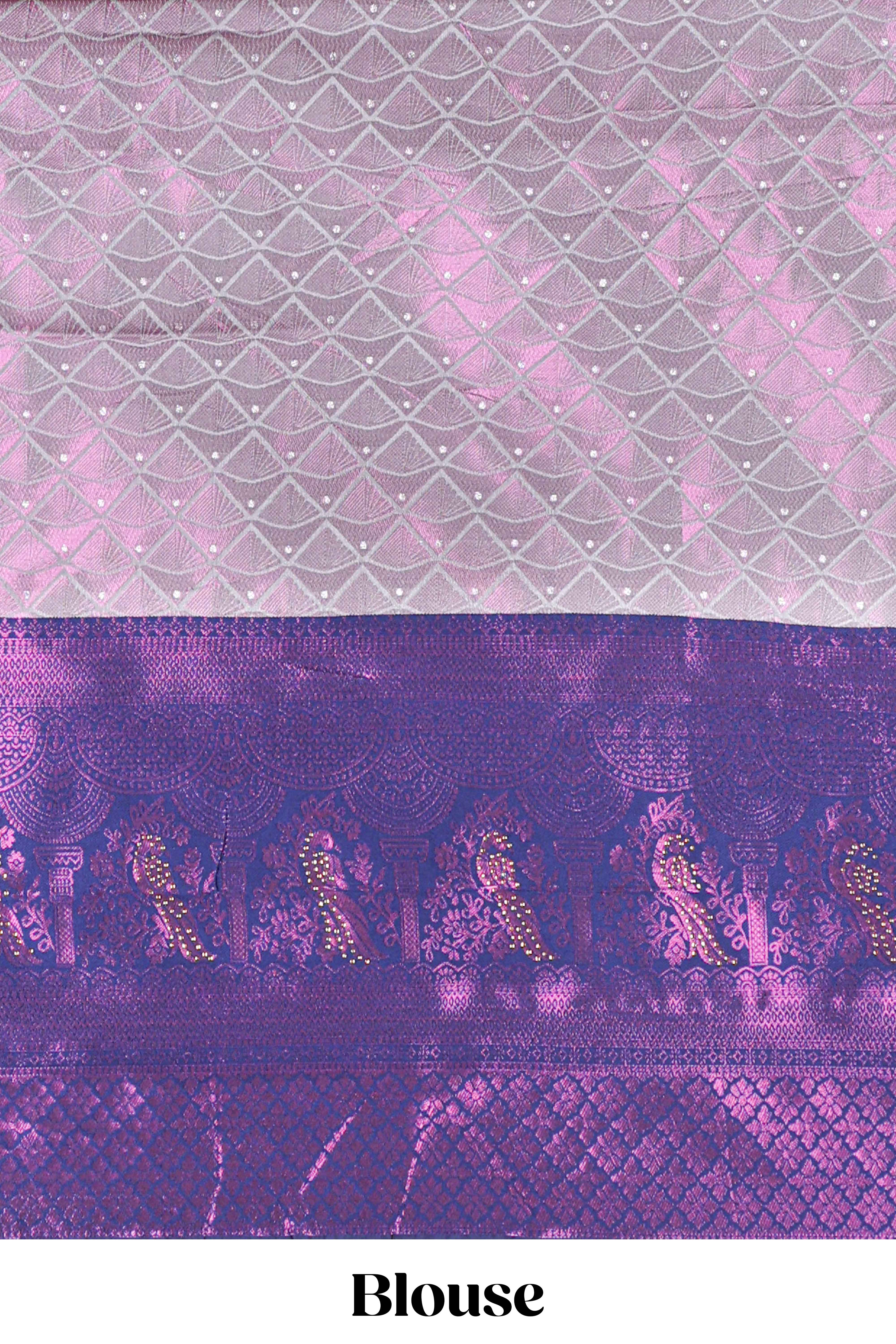 Rich royal purple tissue lehenga featuring intricate thread weaving details with a beautiful contrast border Paired with a brocadeshawl