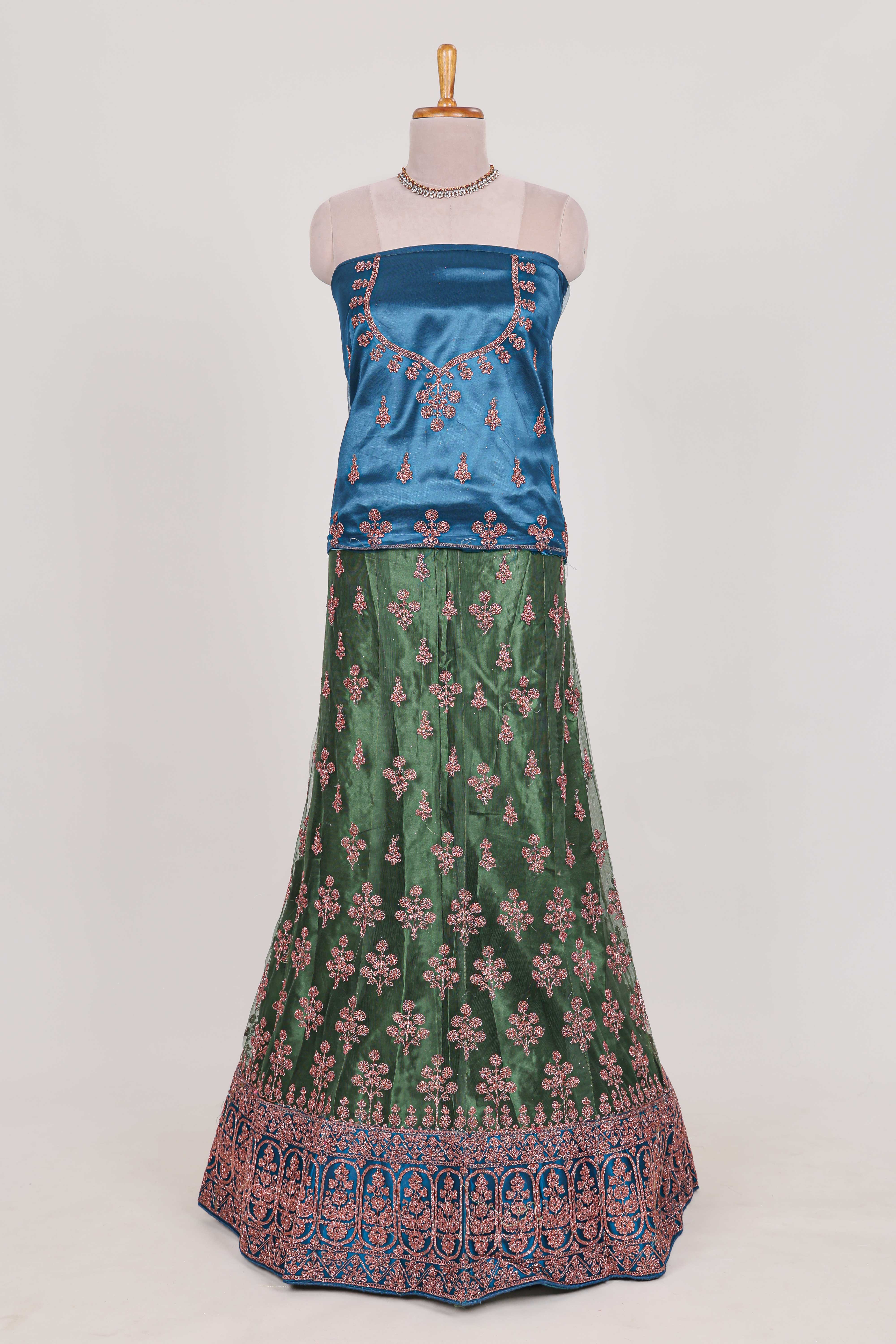 Green and blue Beautiful net lehenga with intricate embroidery stone work and contrast border paired with a contrast net shawl