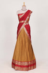 Antique gold Cotton Half Saree with Copper Zari Border Traditional Embroidery and Elegant Tassel Detailing