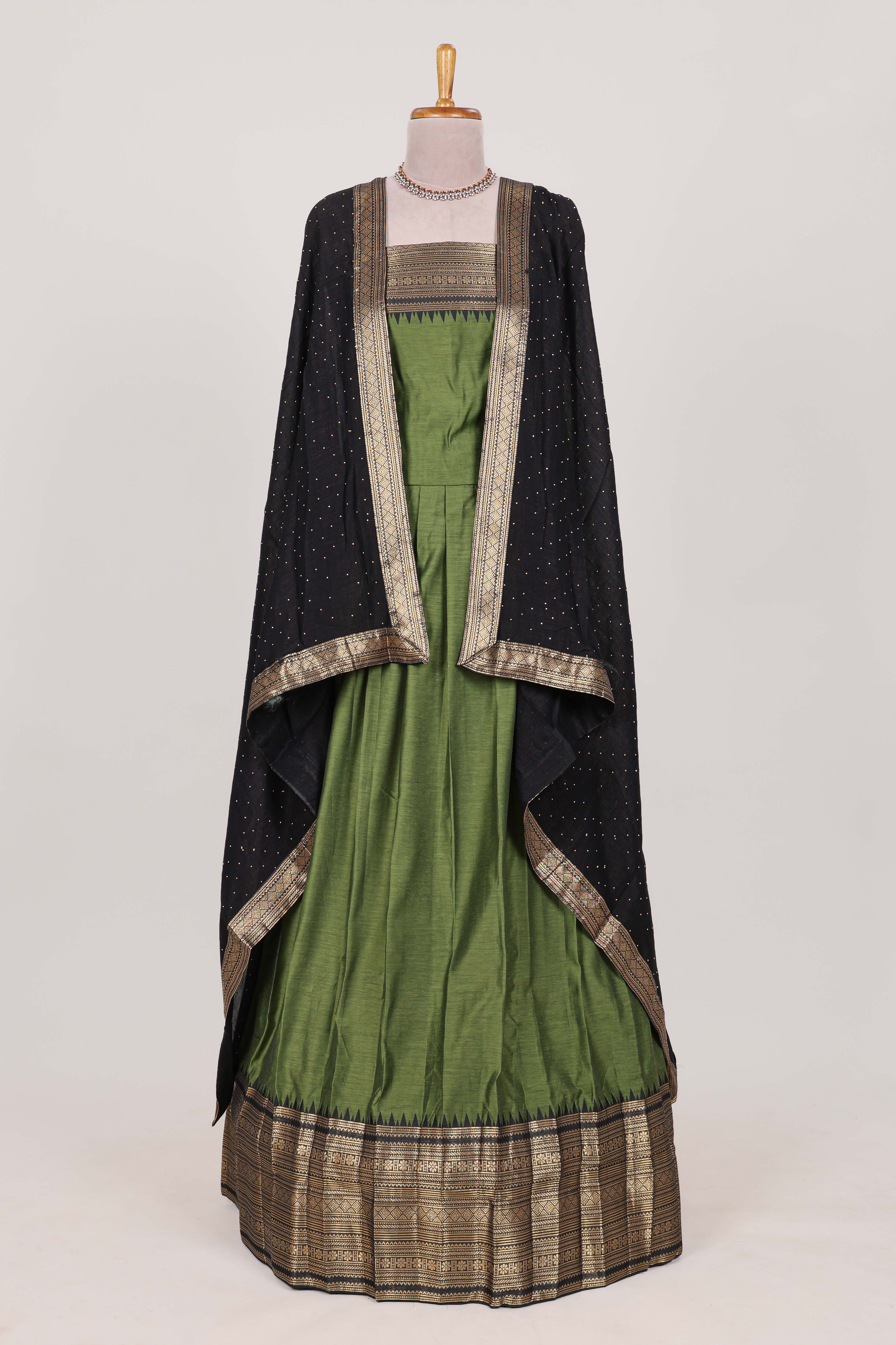 Green with Black Cotton Half Saree with Gold Zari Border Traditional Embroidery and Elegant Tassel Detailing