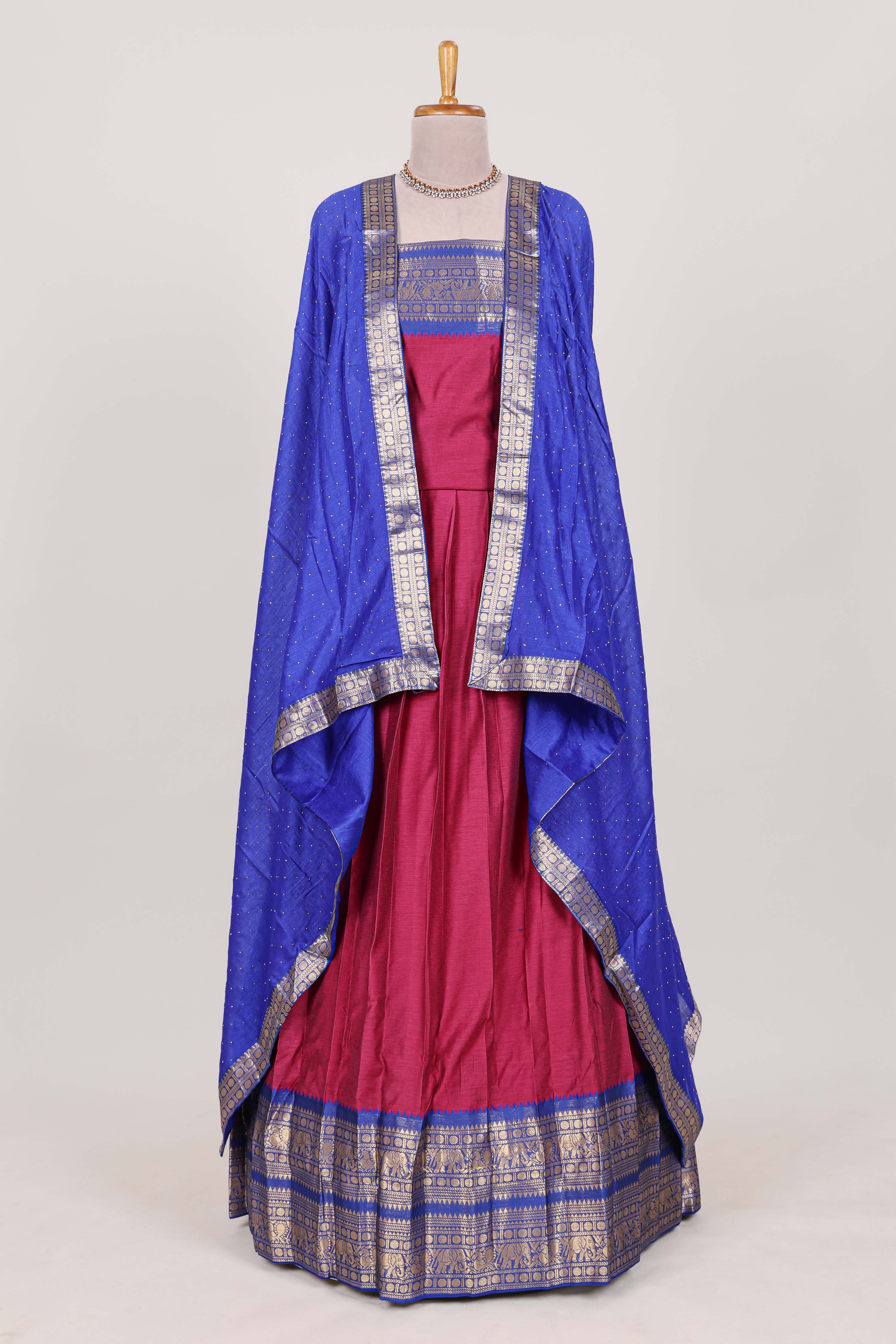 Magenta Cotton Half Saree with Gold Zari Border Traditional Embroidery and Elegant Tassel Detailing