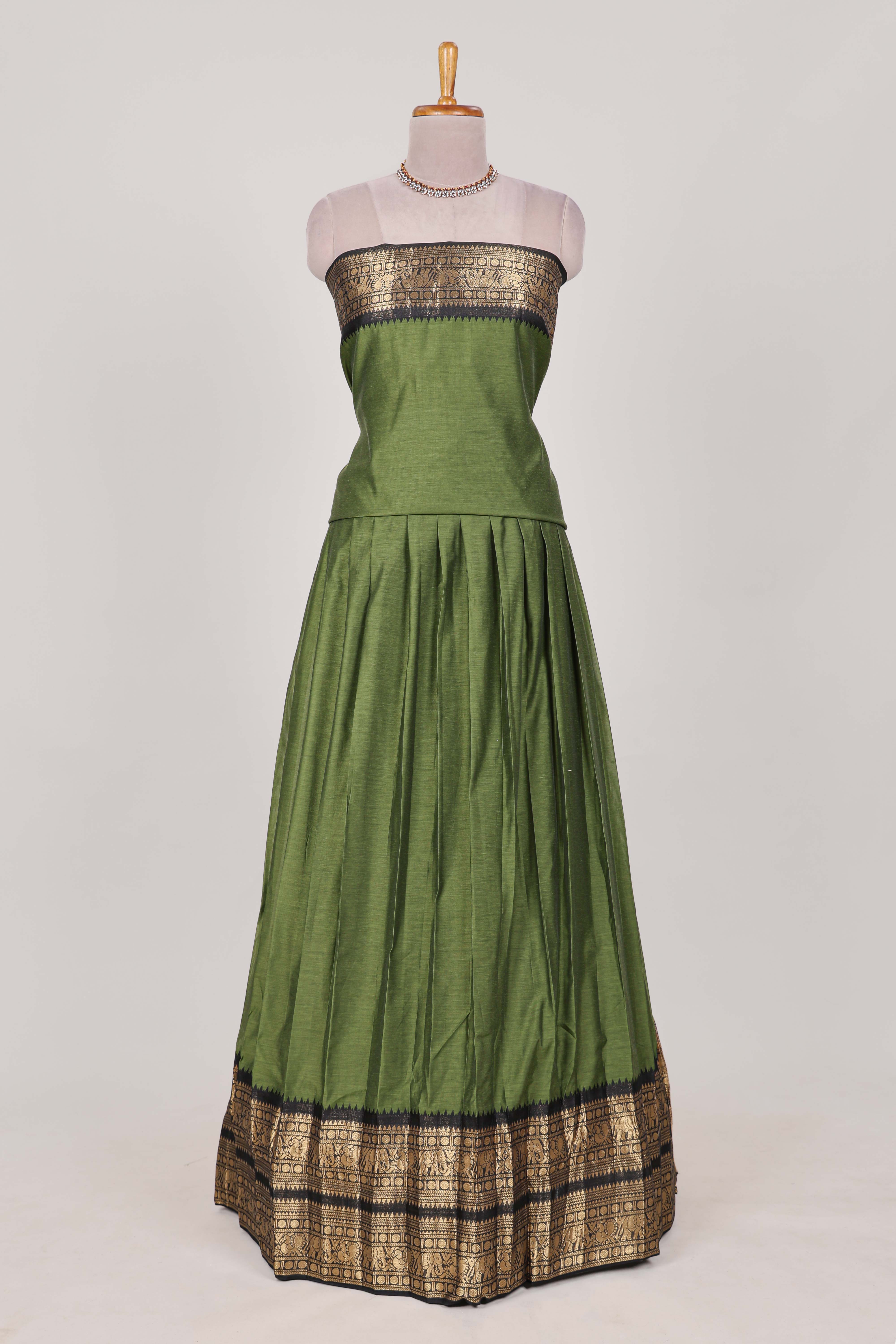 Green Cotton Half Saree with Gold Zari Border Traditional Embroidery and Elegant Tassel Detailing