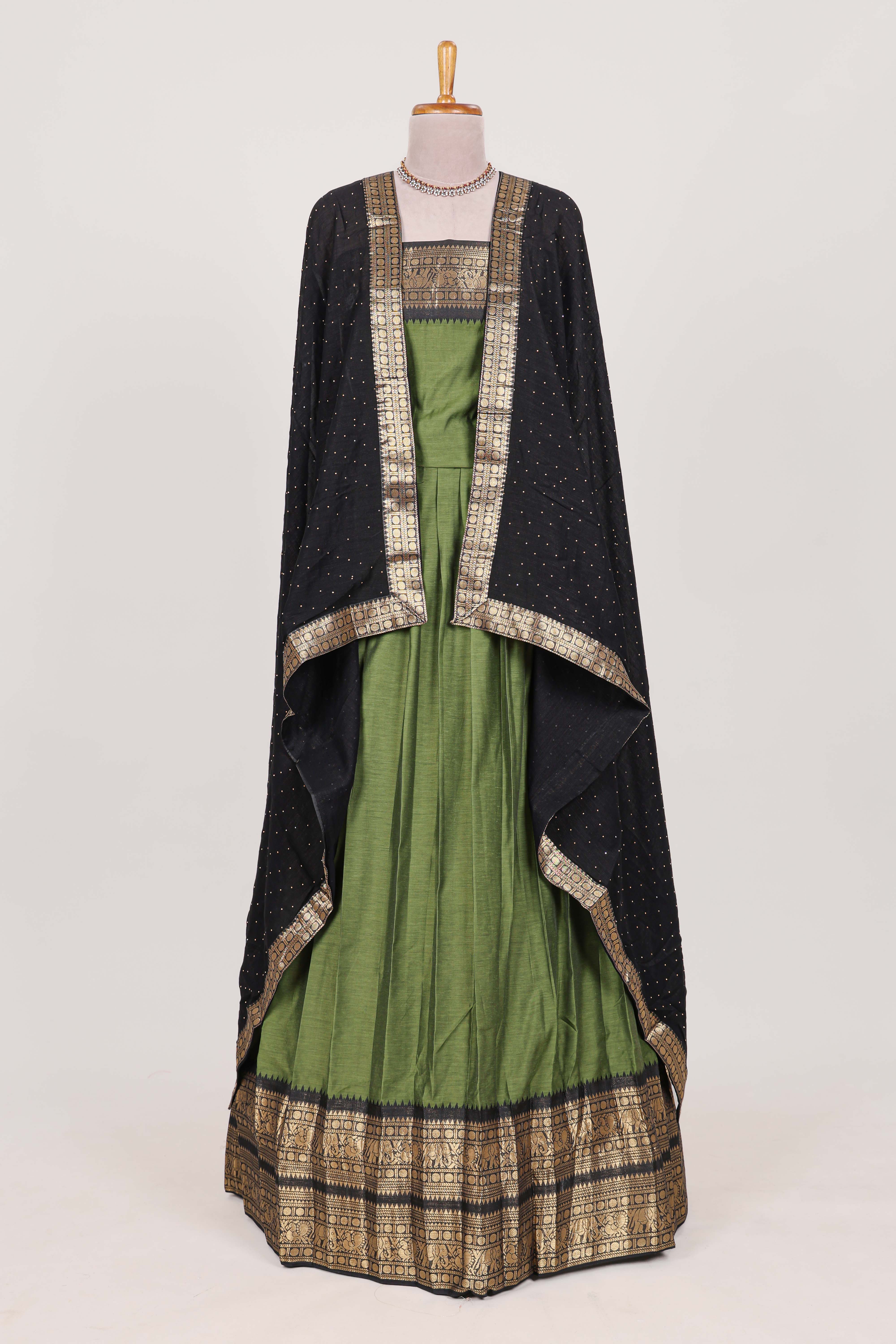 Green Cotton Half Saree with Gold Zari Border Traditional Embroidery and Elegant Tassel Detailing