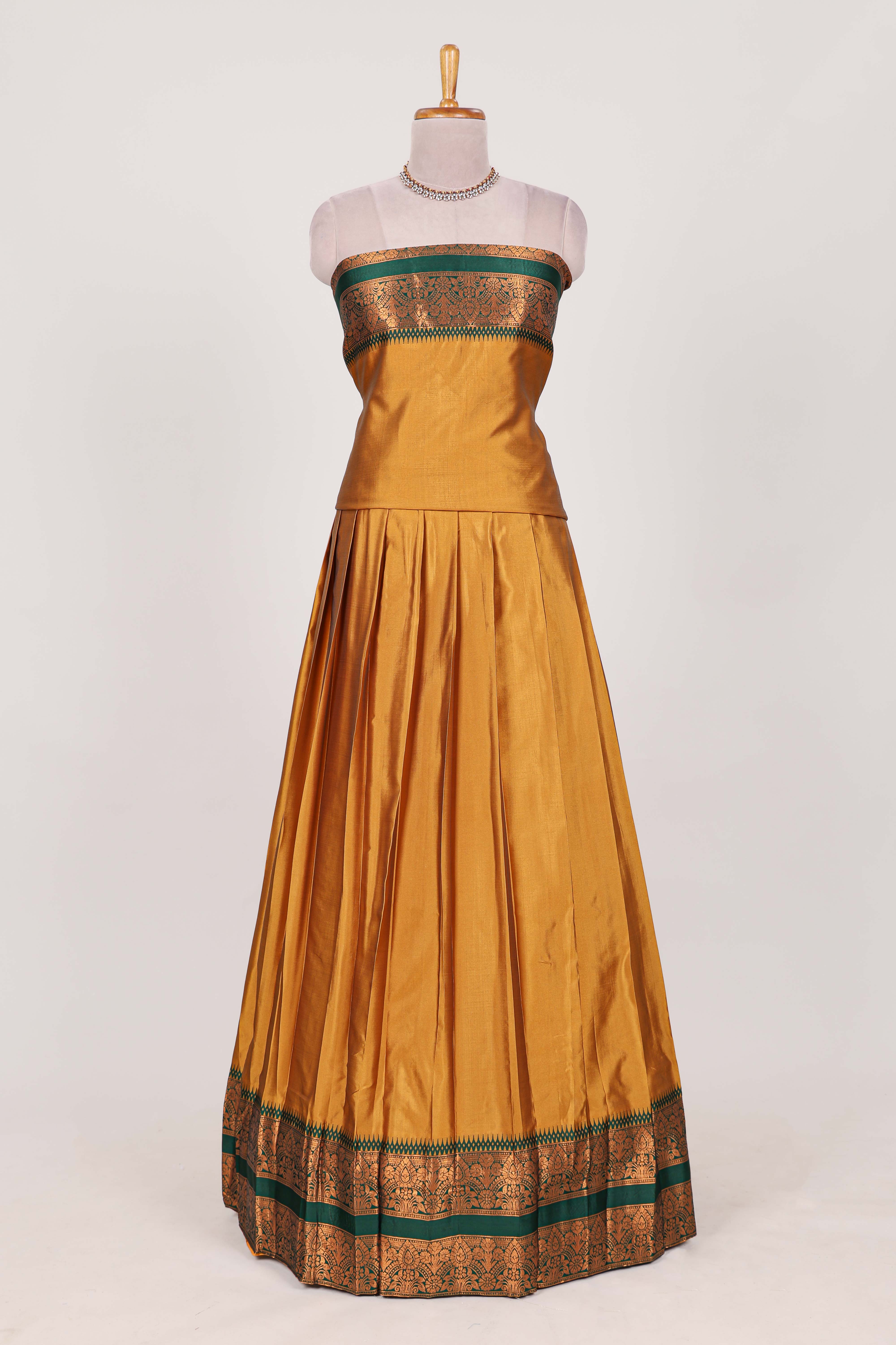 Mustard yellow Cotton Half Saree with Copper Zari Border Traditional Embroidery and Elegant Tassel Detailing