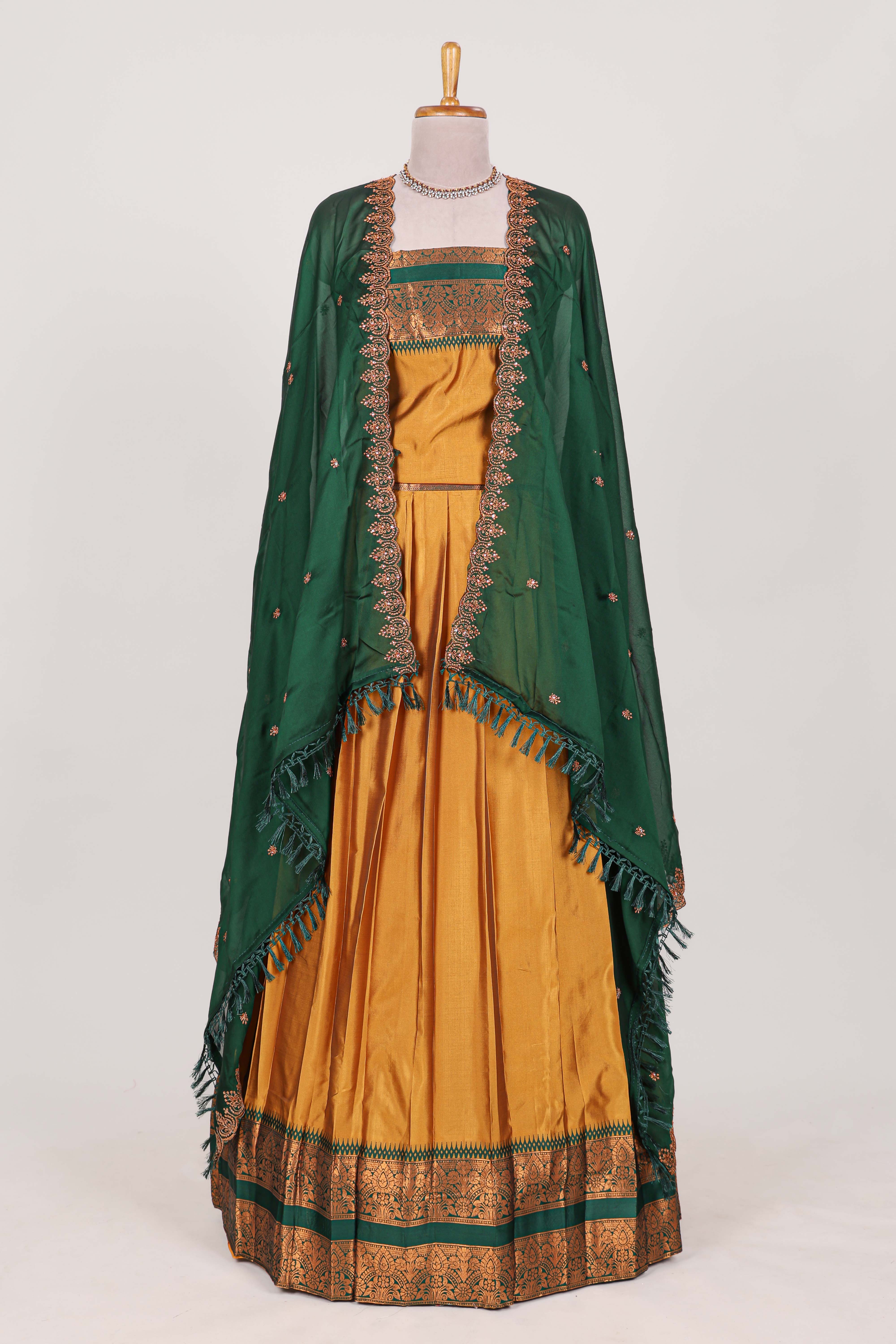 Mustard yellow Cotton Half Saree with Copper Zari Border Traditional Embroidery and Elegant Tassel Detailing
