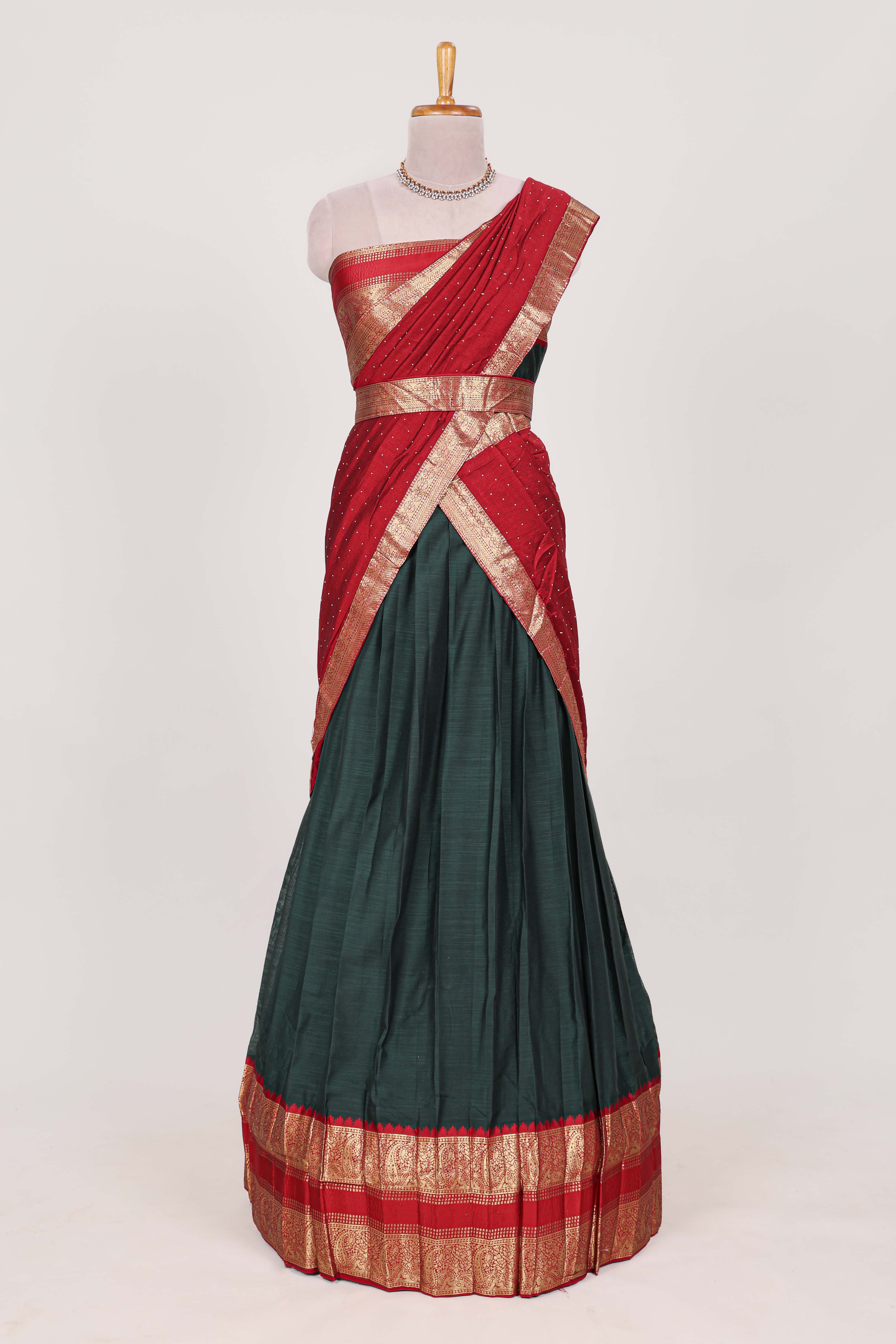 Dark Green Cotton Half Saree with Gold Zari Border Traditional Embroidery and Elegant Tassel Detailing