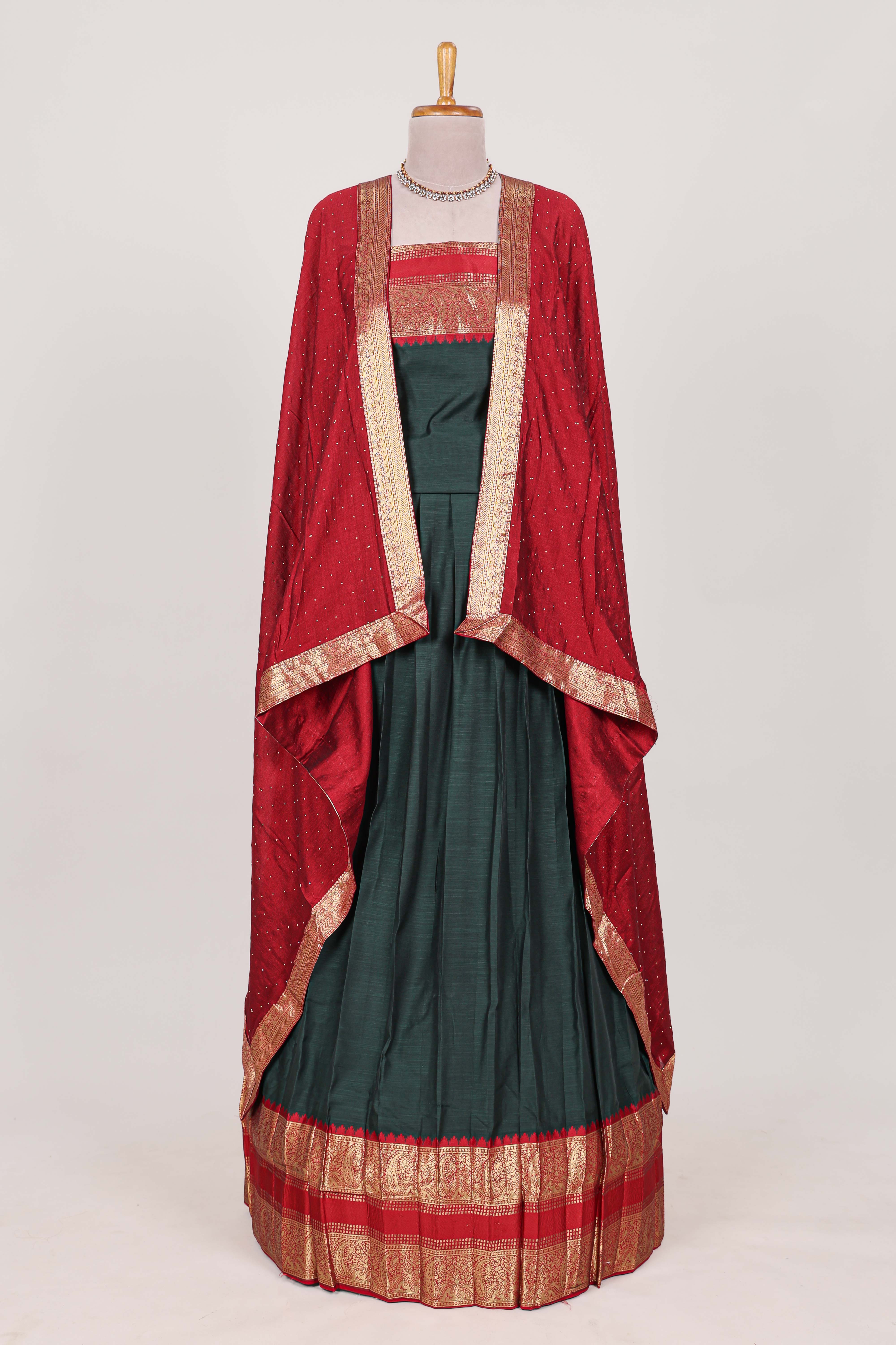 Dark Green Cotton Half Saree with Gold Zari Border Traditional Embroidery and Elegant Tassel Detailing