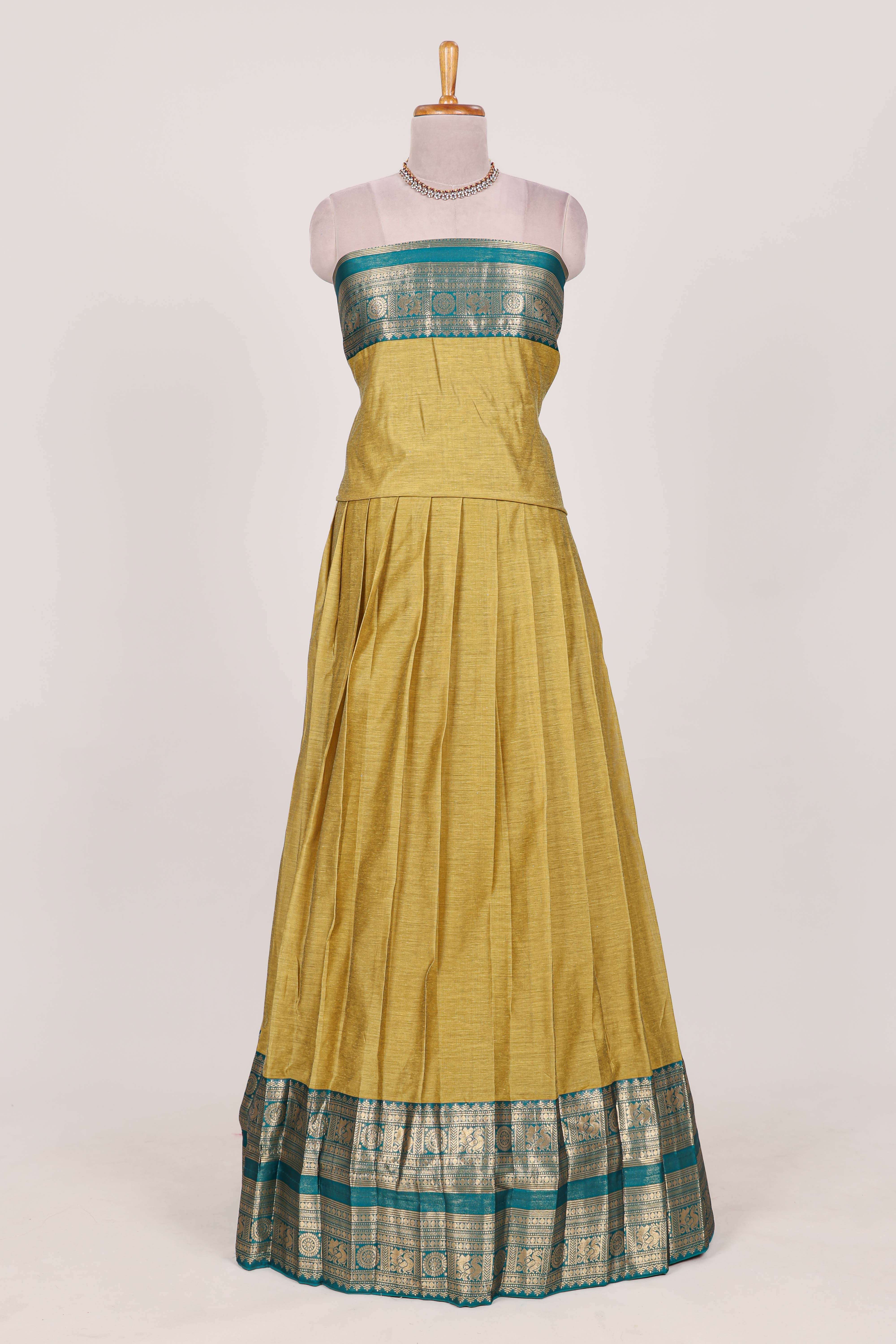 Golden Green Cotton Half Saree with Gold Zari Border Traditional Embroidery and Elegant Tassel Detailing