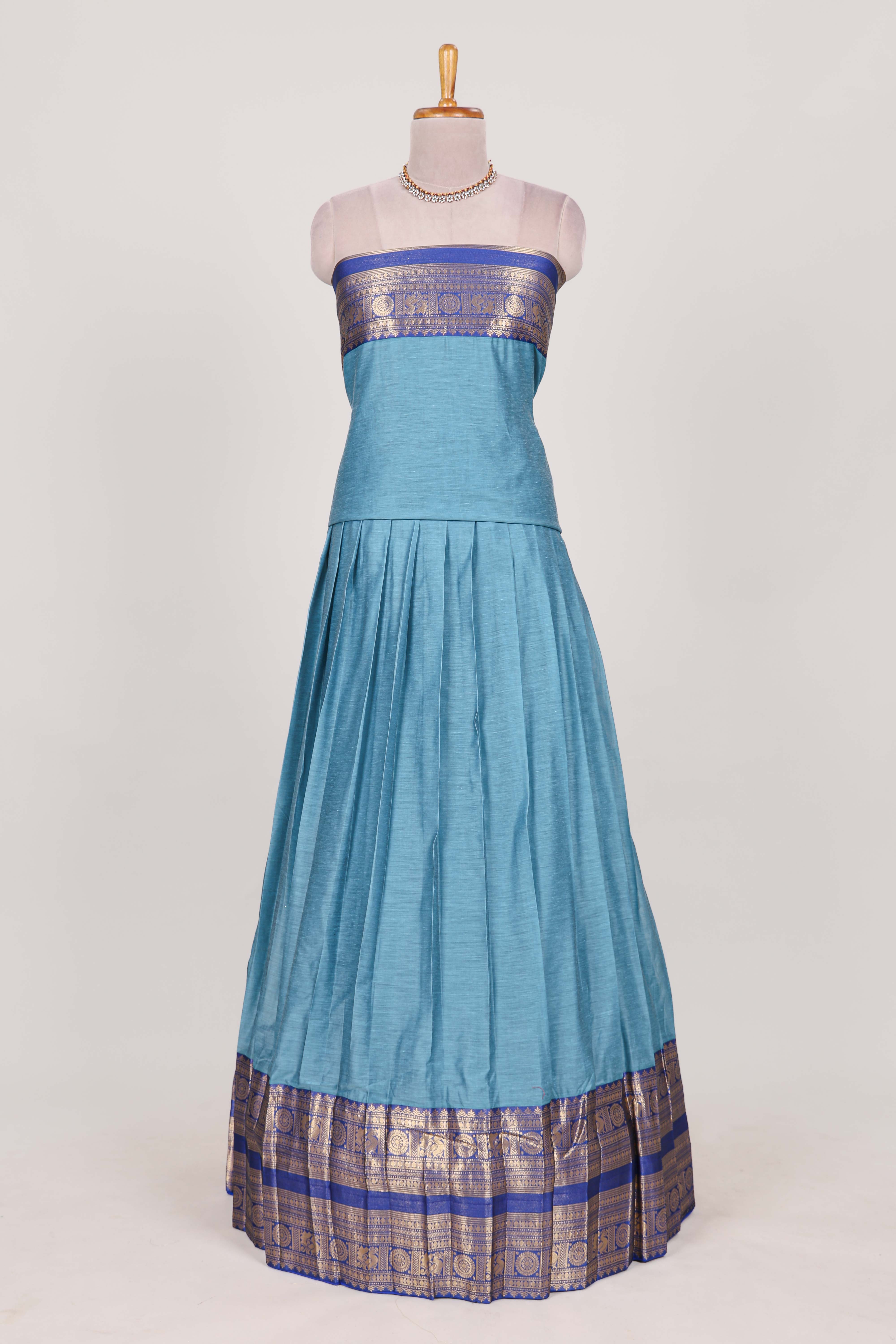 Sky blue Cotton Half Saree with Gold Zari Border Traditional Embroidery and Elegant Tassel Detailing