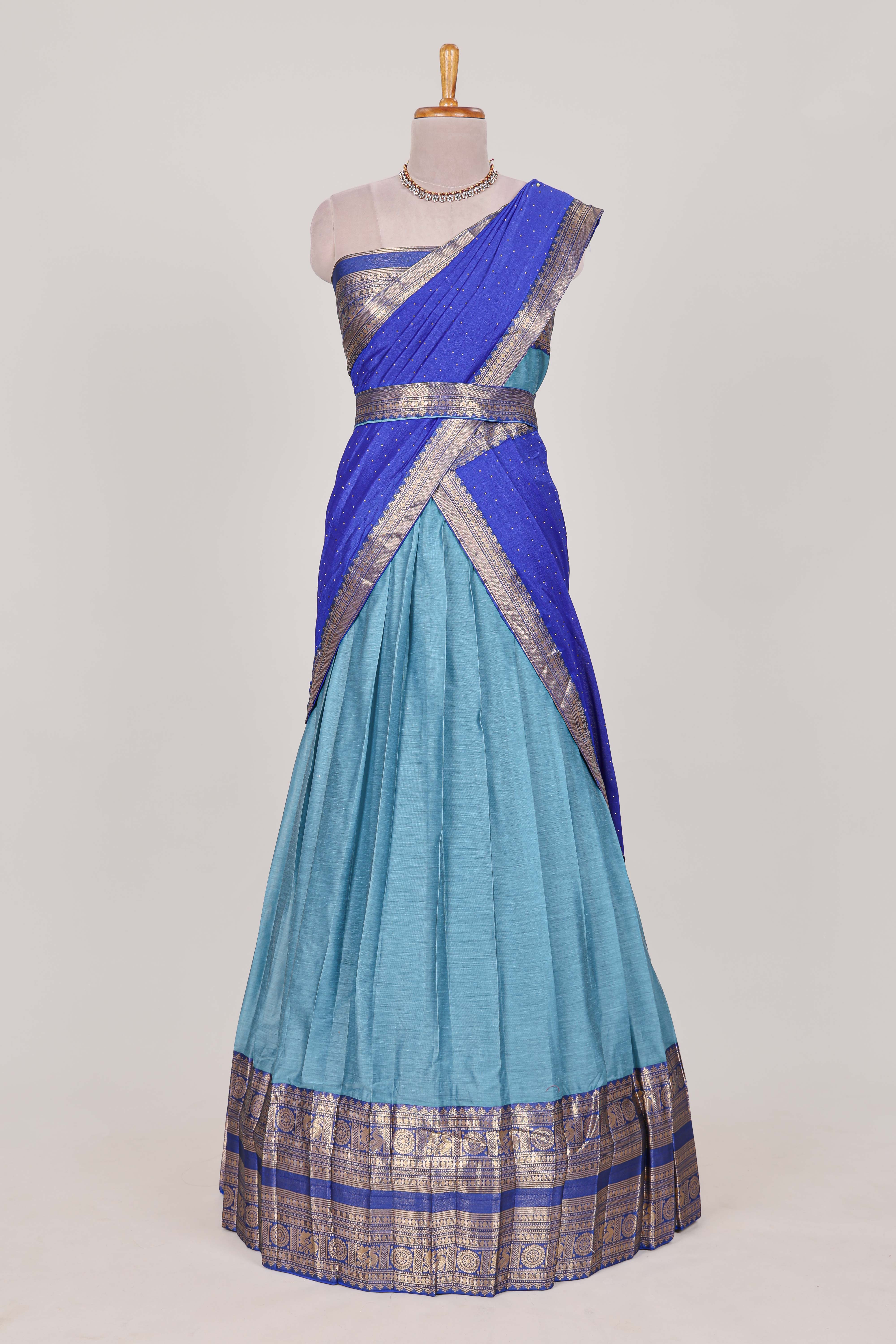 Sky blue Cotton Half Saree with Gold Zari Border Traditional Embroidery and Elegant Tassel Detailing